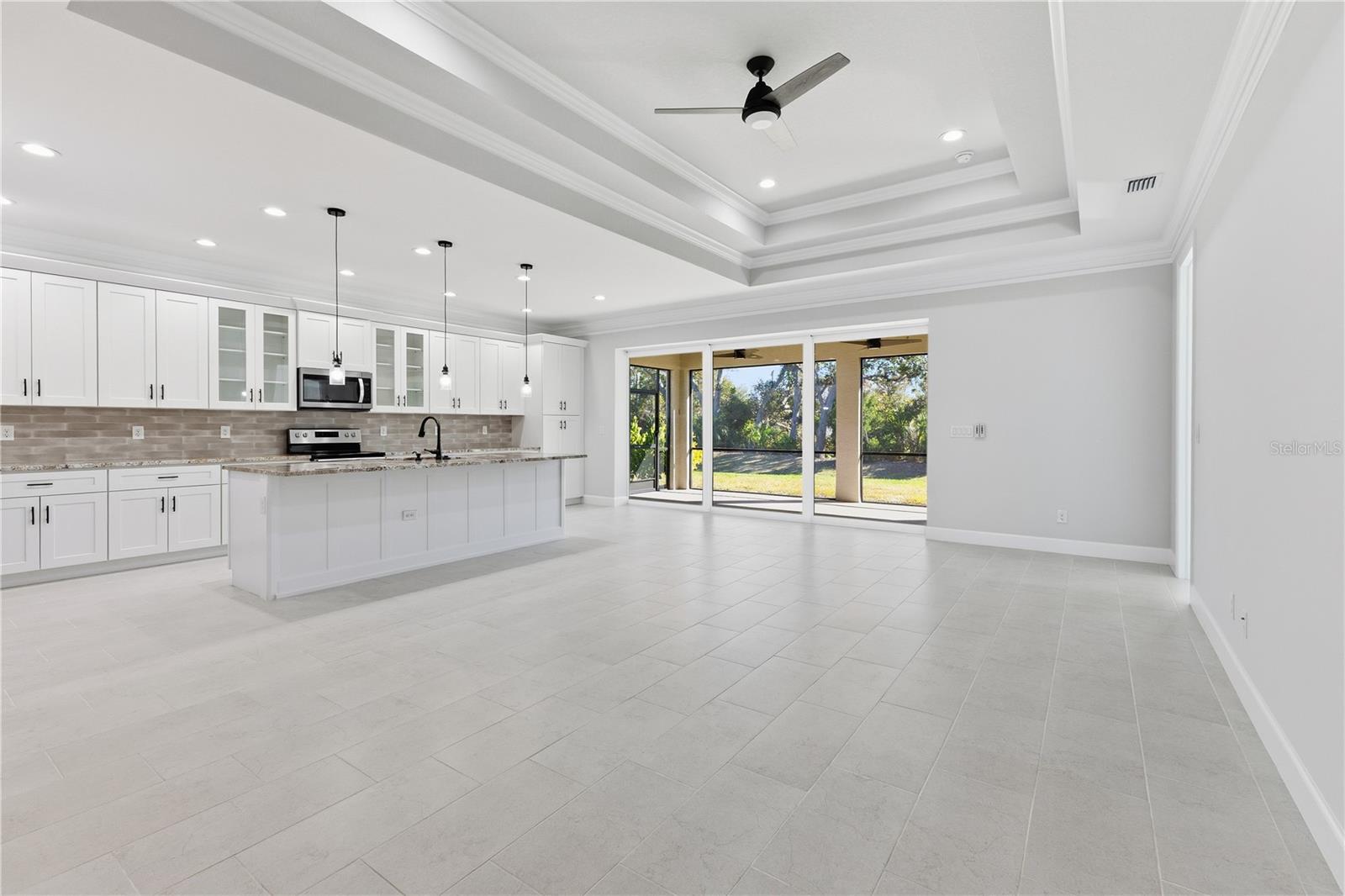 721 Redbud Ct, Englewood, FL 34223 — photo 4 of 51