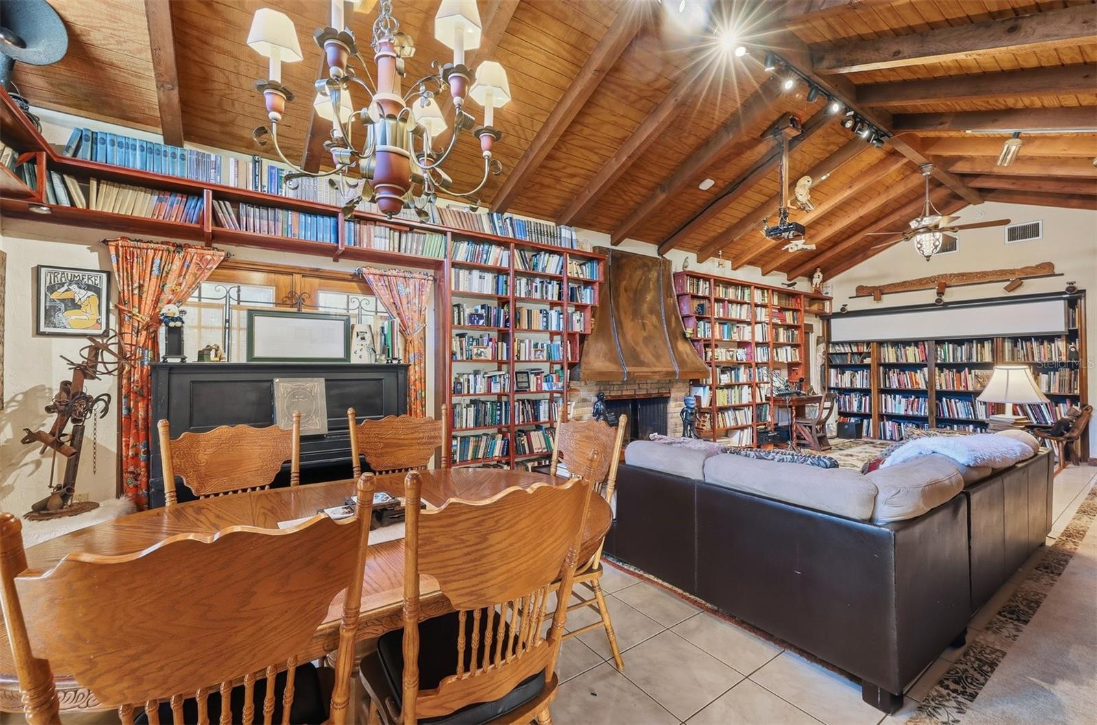 Family Room with Cathedral Ceiling and Copper Hood Fireplace