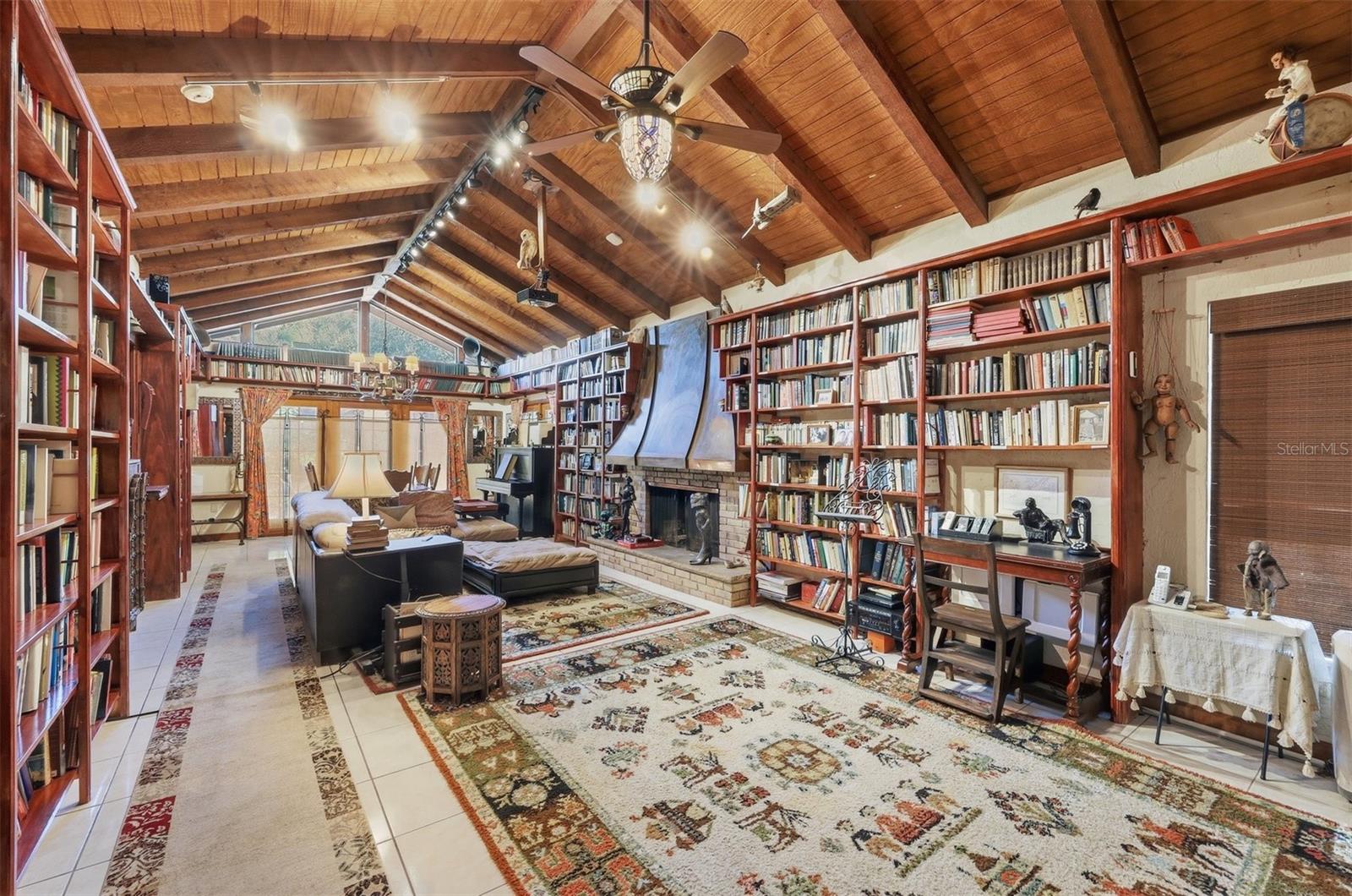 Family Room with Cathedral Ceiling and Copper Hood Fireplace