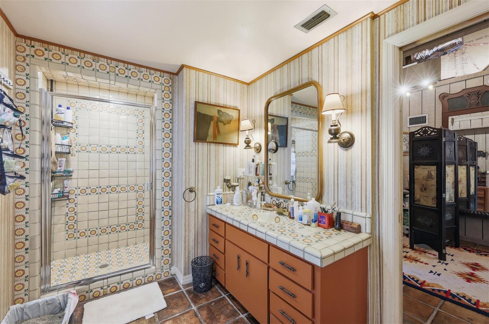 Decorative Mexican Tile in Bathroom of Guest House with Large Shower.