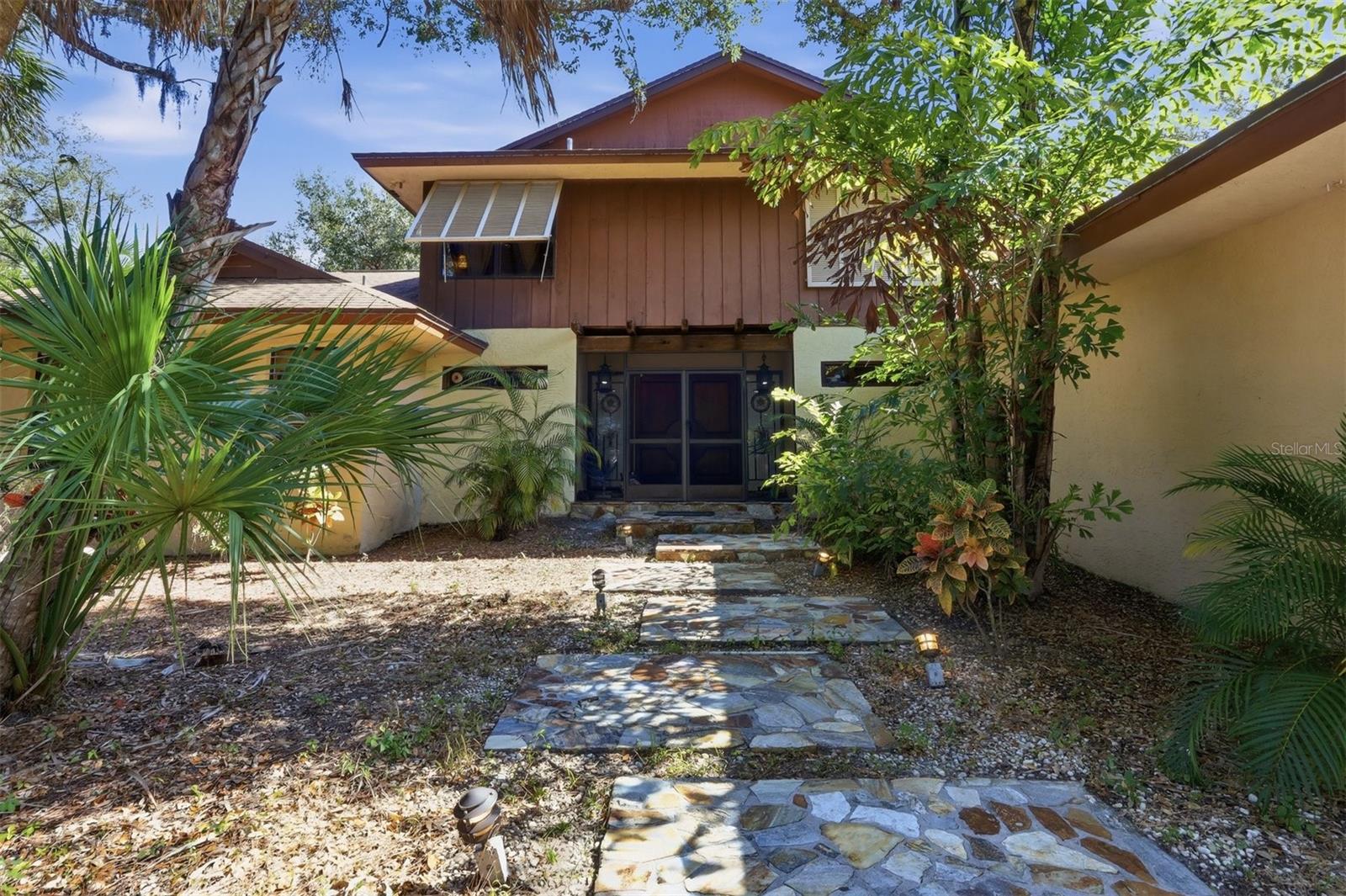 Stone Walkway to Double Door Entrance