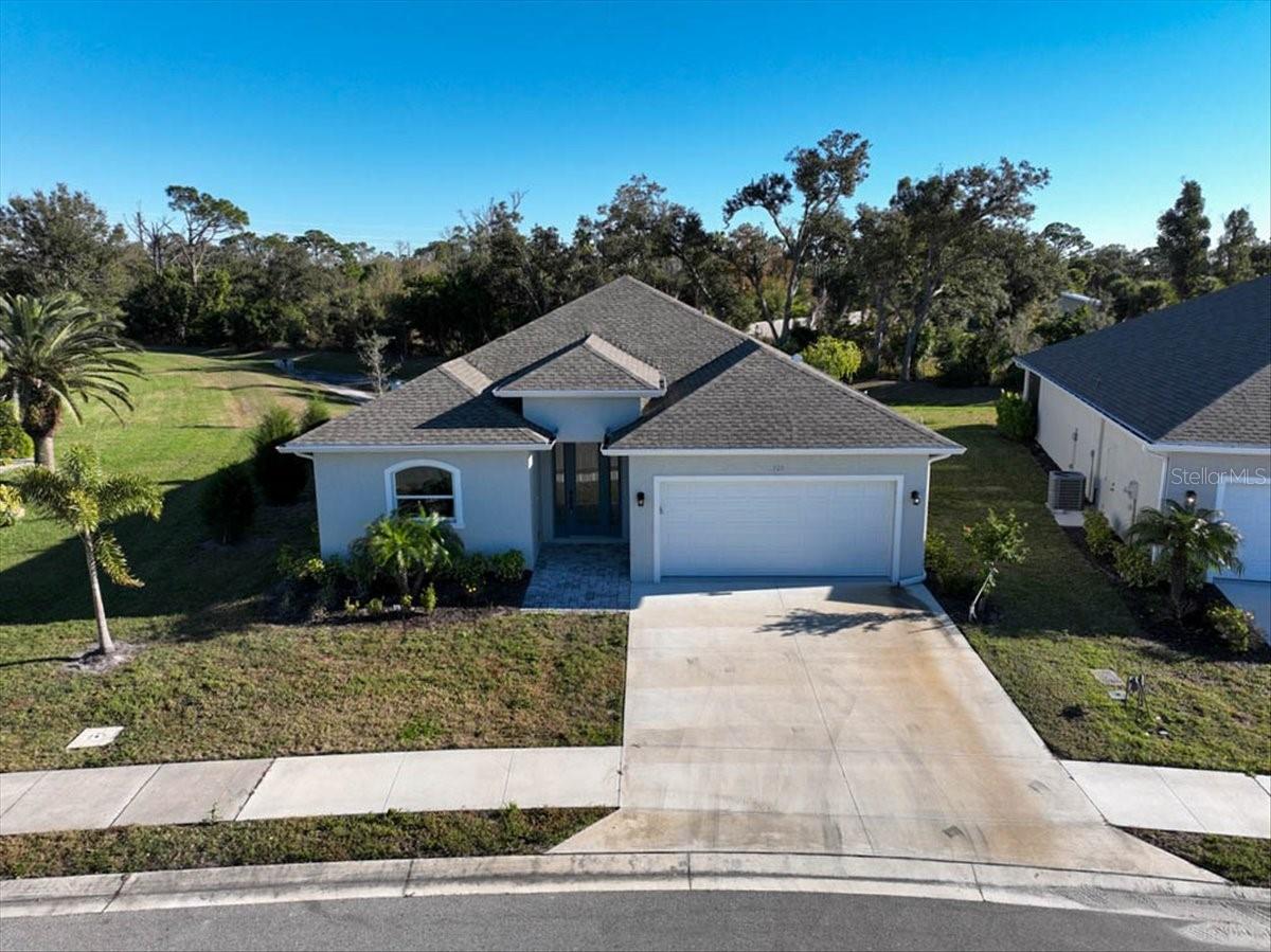 725 Redbud Ct, Englewood, FL 34223 — photo 2 of 51