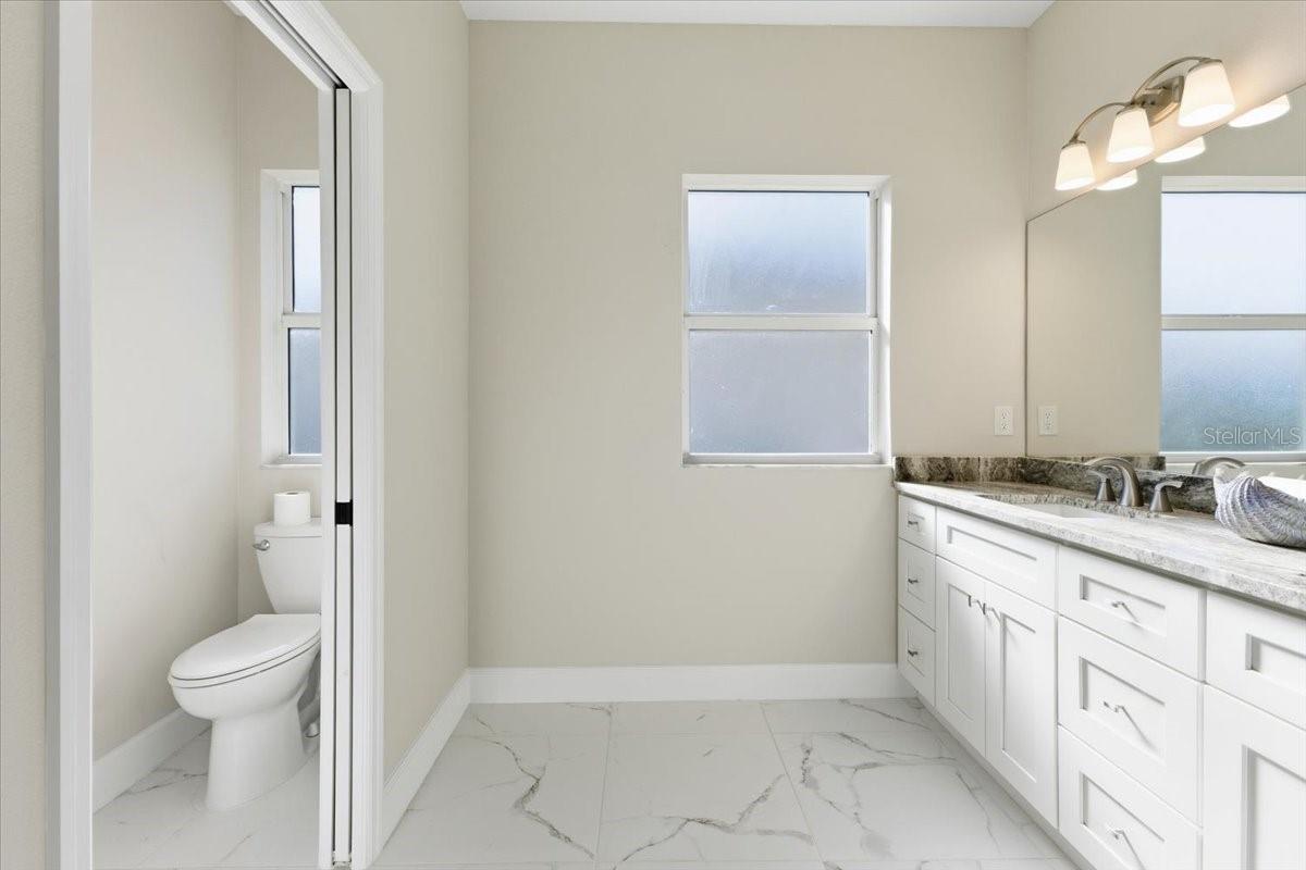 725 Redbud Ct, Englewood, FL 34223 — photo 26 of 51