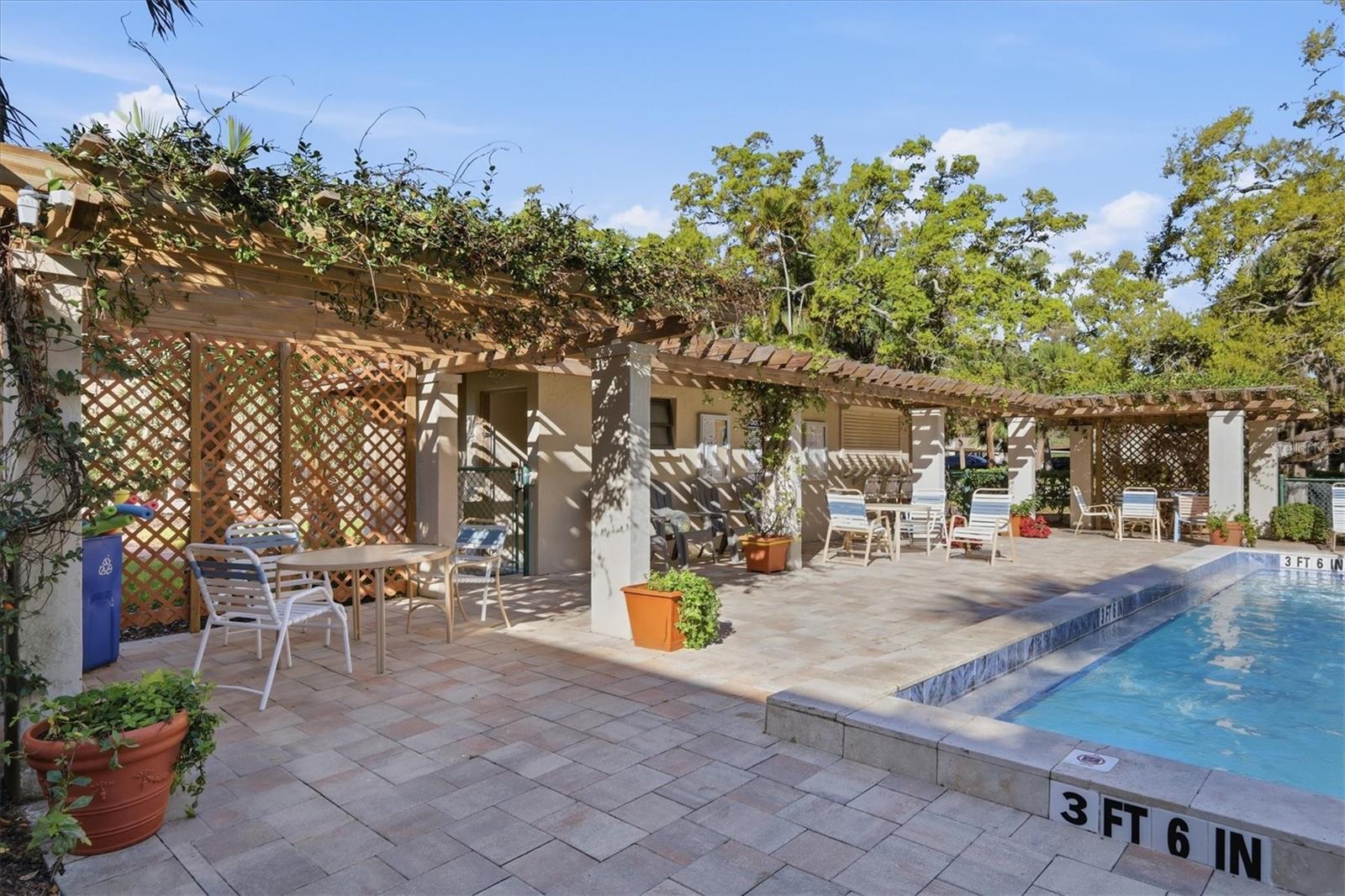 covered pergolas at pool deck