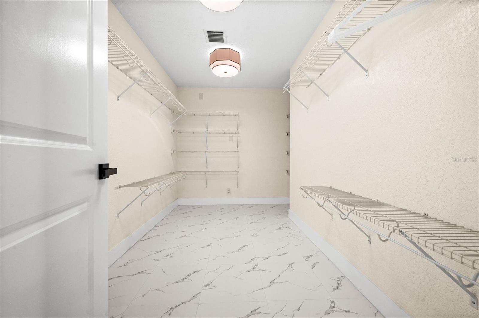 Large walk in closet in Primary Bedroom