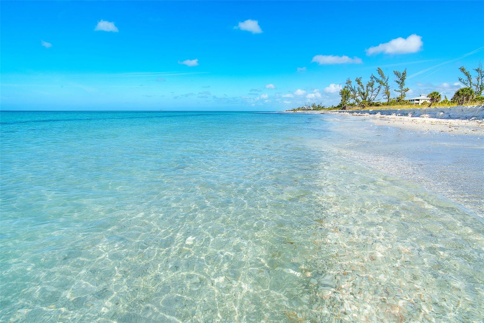 Crystal clear water complimenting the white sand beach