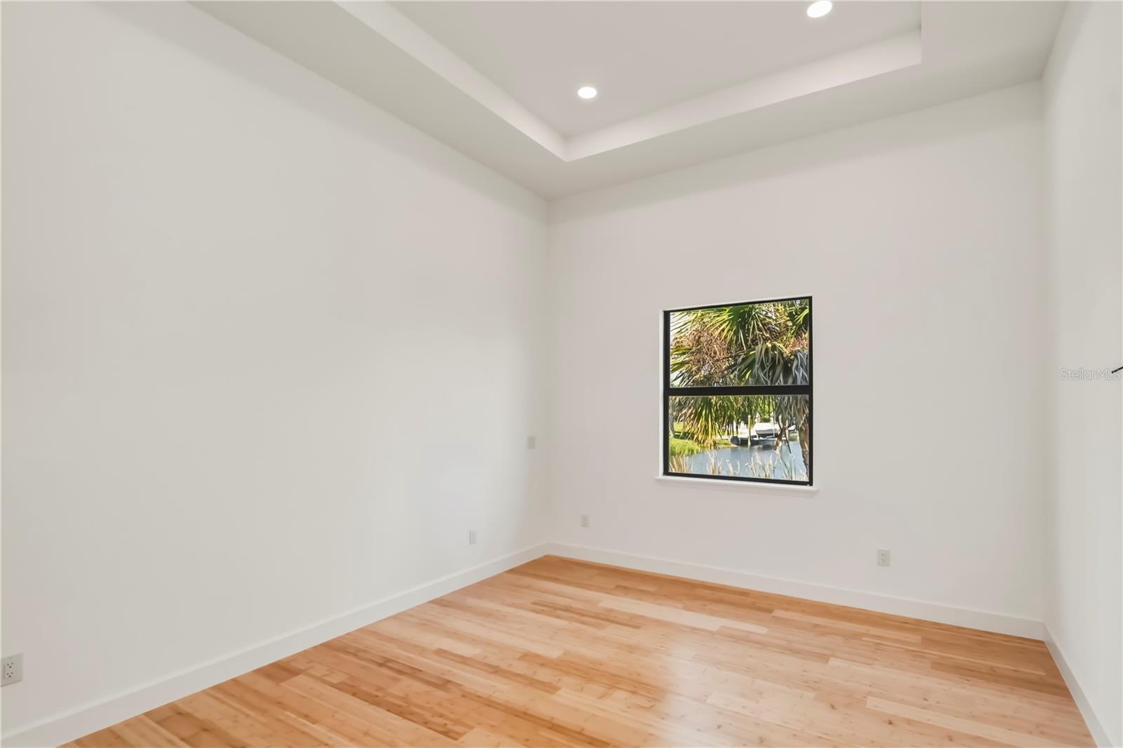Primary Bedroom with Tray Ceiling.
