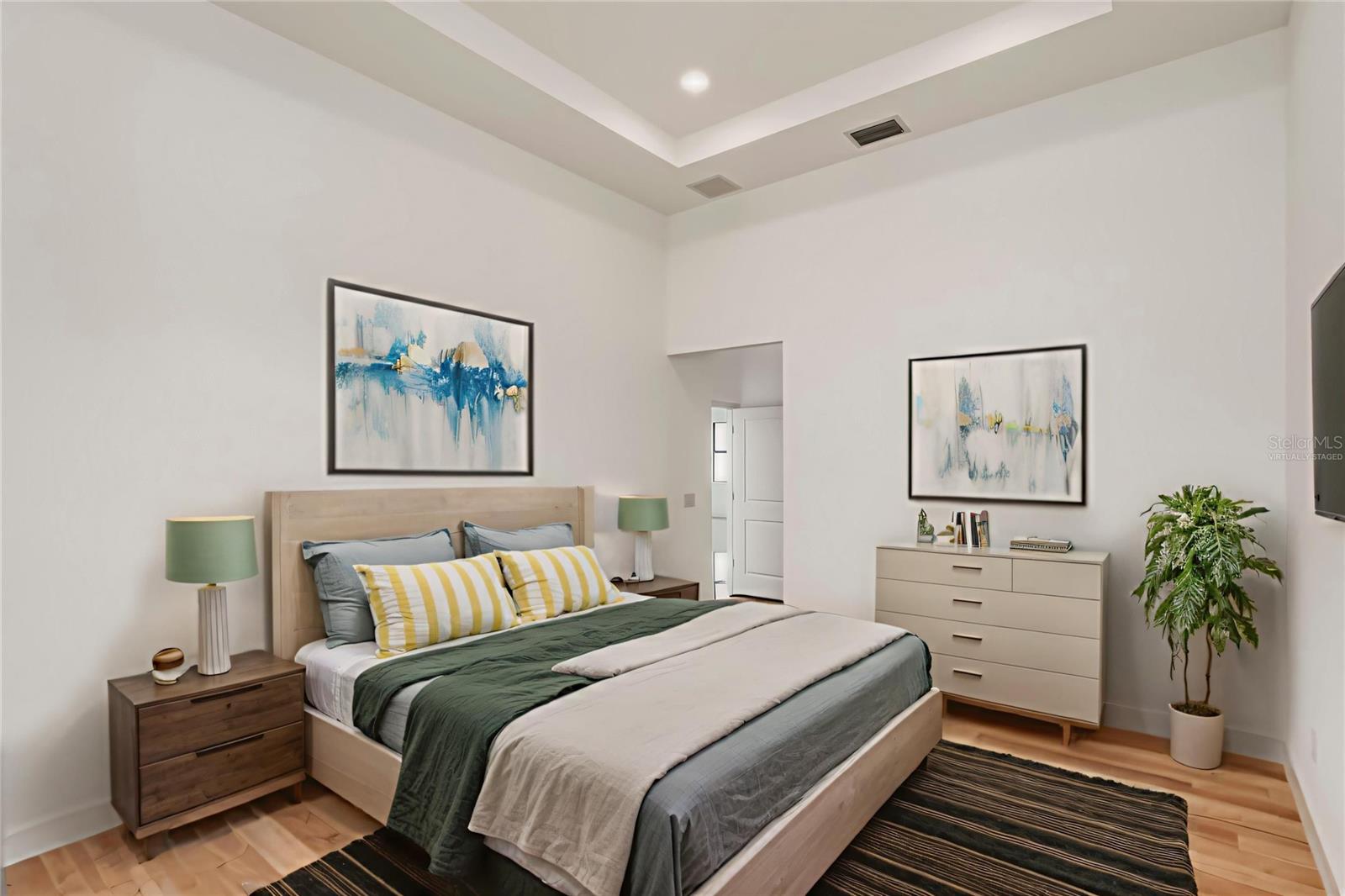 Virtually Staged Primary Suite with Tray Ceiling.