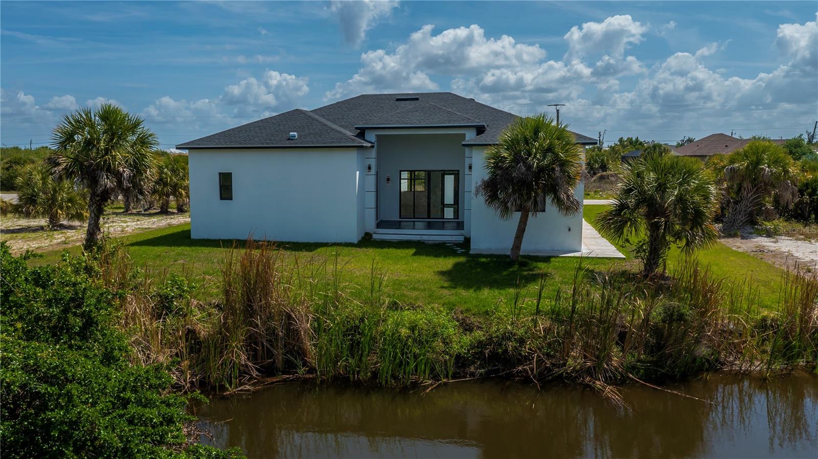 10165 & 10157 Kingsville Dr, Port Charlotte, FL 33981 — photo 49 of 61