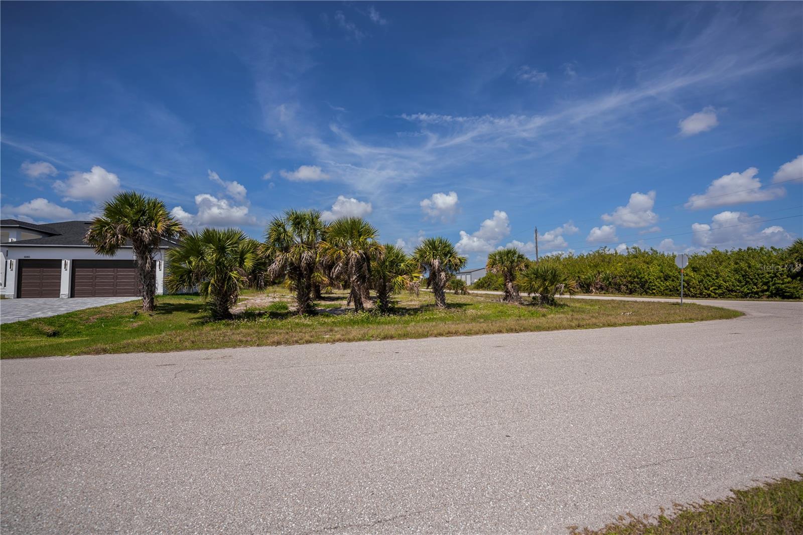 Nearly Half-Acre Double Corner Lot with Gulf Access.