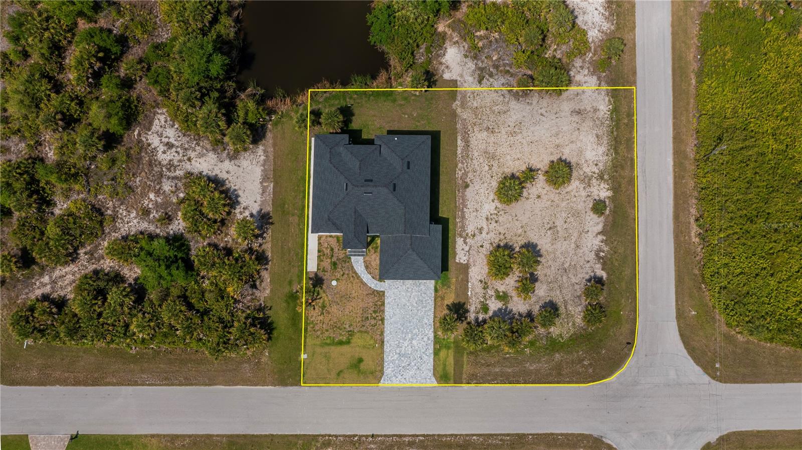 Nearly Half-Acre Double Corner Lot with Gulf Access.