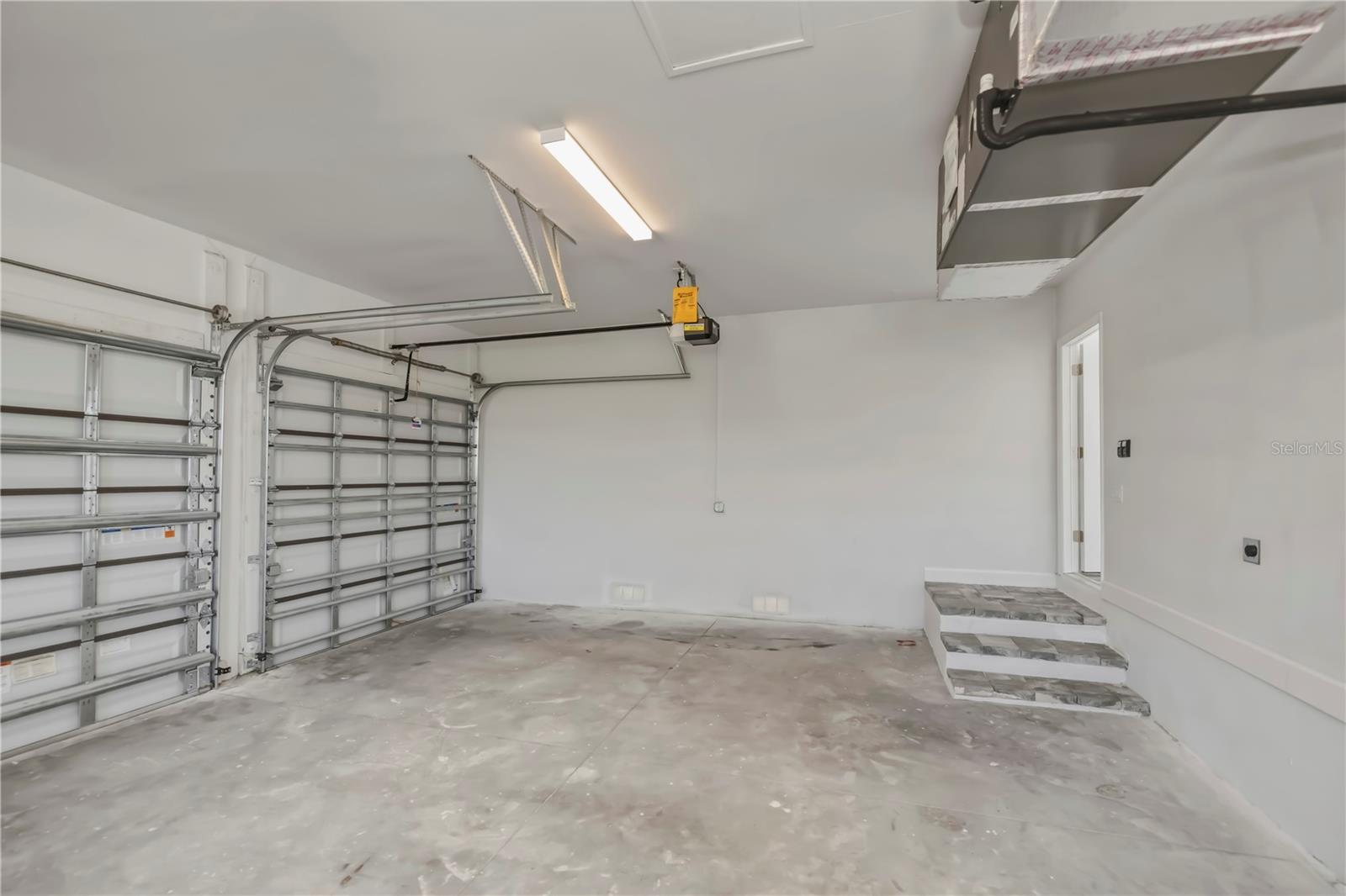 Spacious 3 Car Garage.