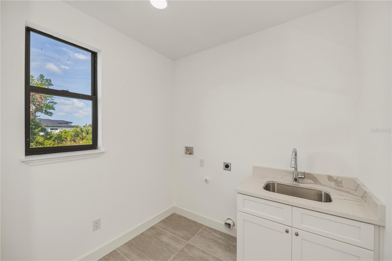 Laundry Room with Utility Sink.