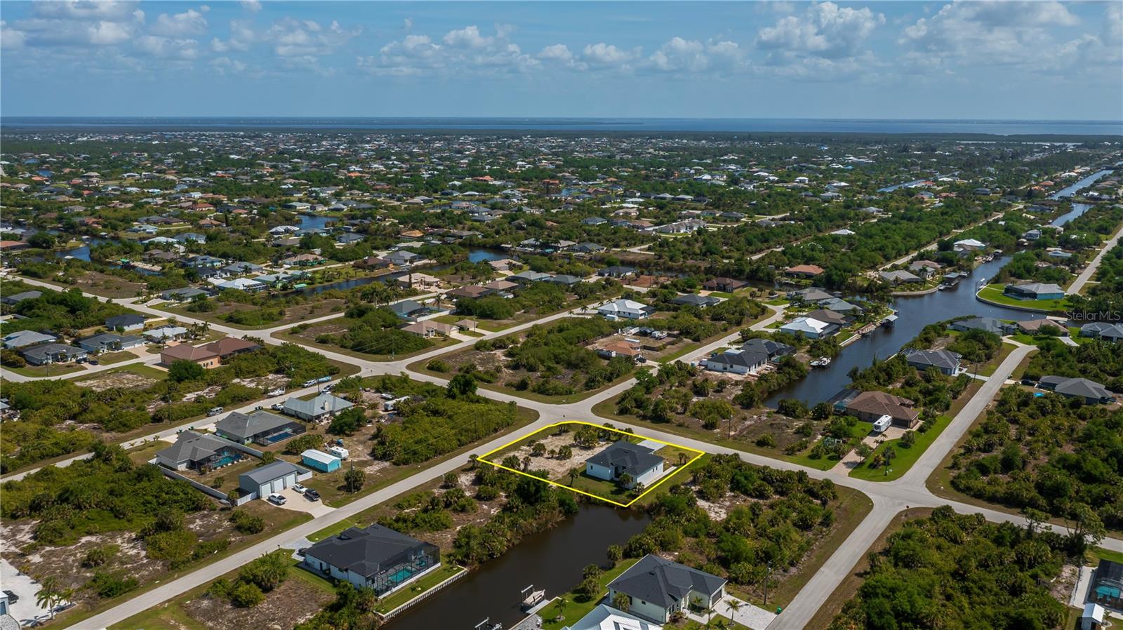 Nearly Half-Acre Double Corner Lot with Gulf Access.
