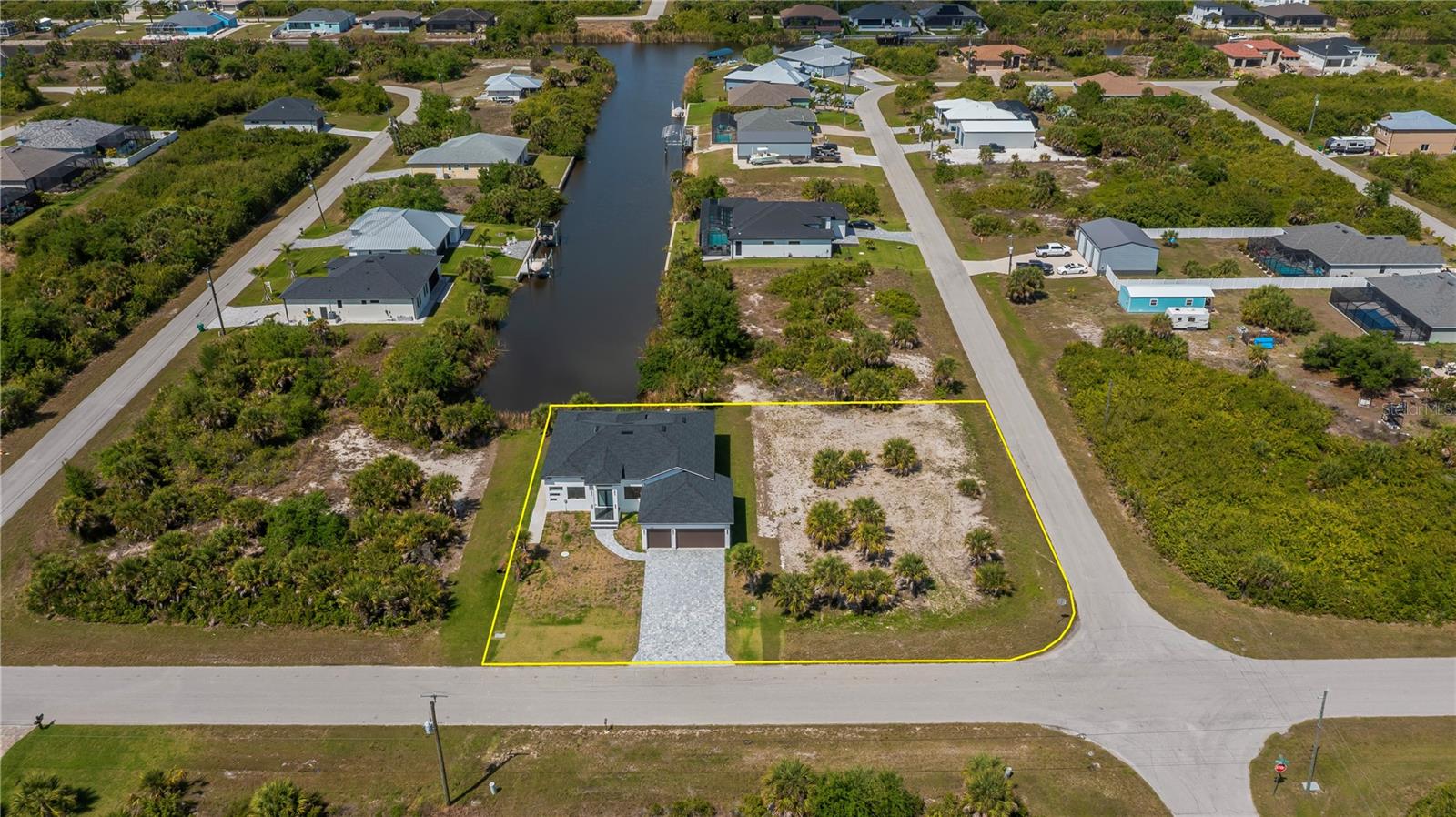 Nearly Half-Acre Double Corner Lot with Gulf Access.