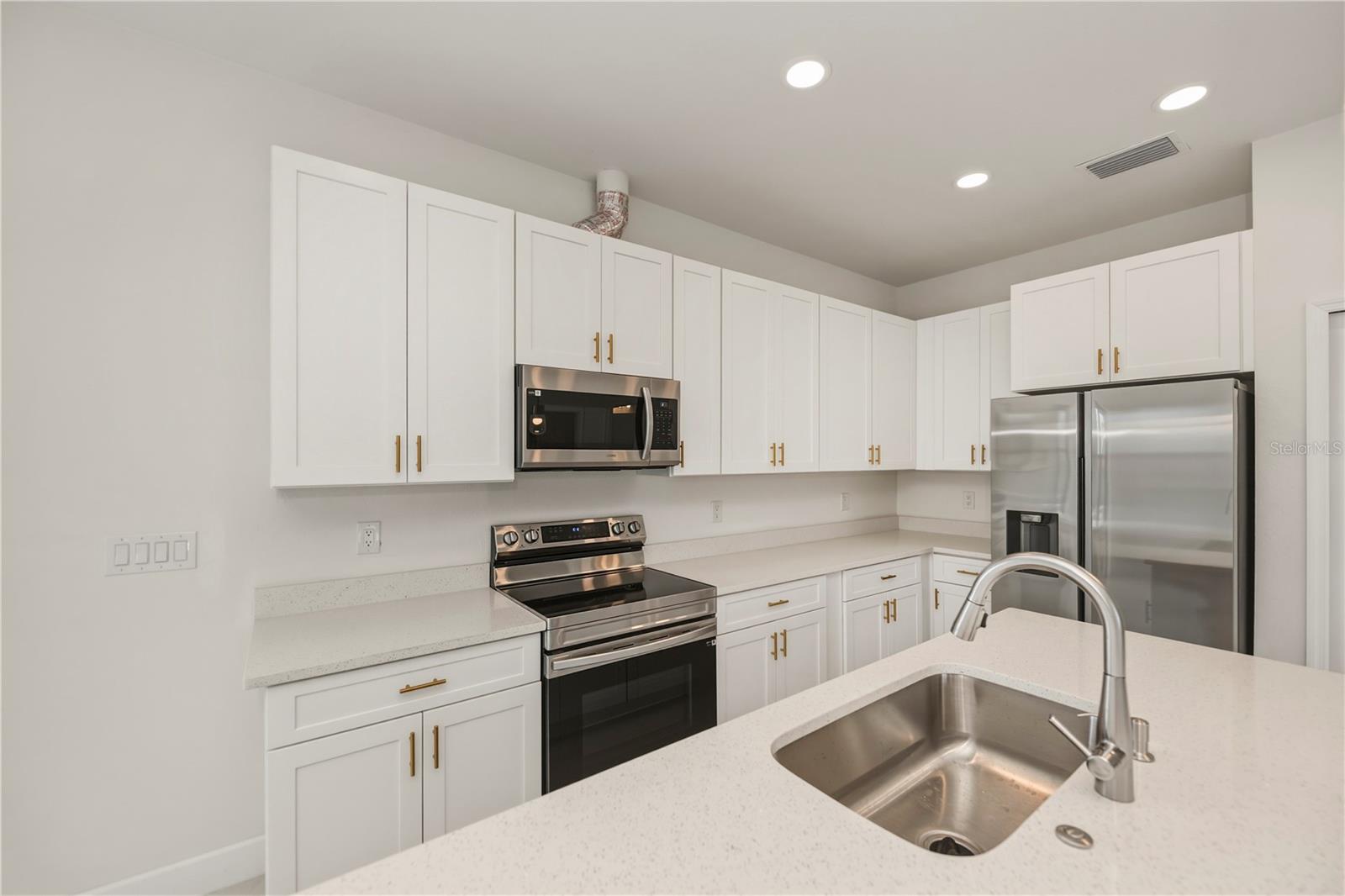 Stainless Steel Appliances and Ample Cabinet and Counter Space.