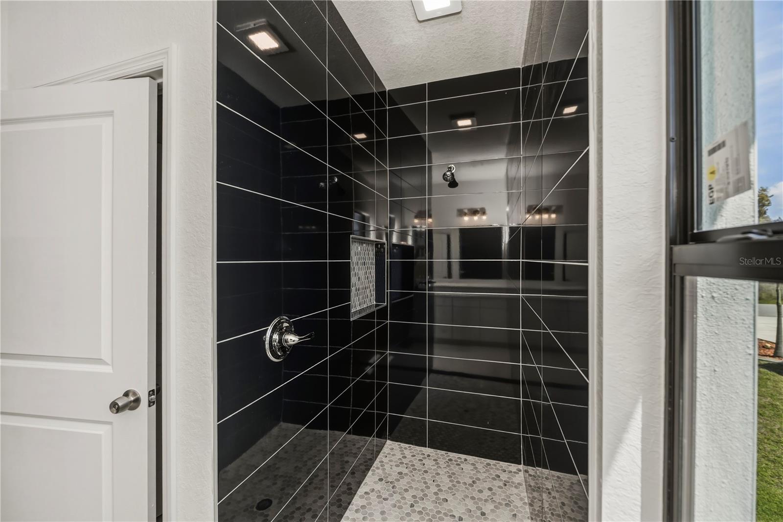 Spa inspired Primary Walk-In Shower.