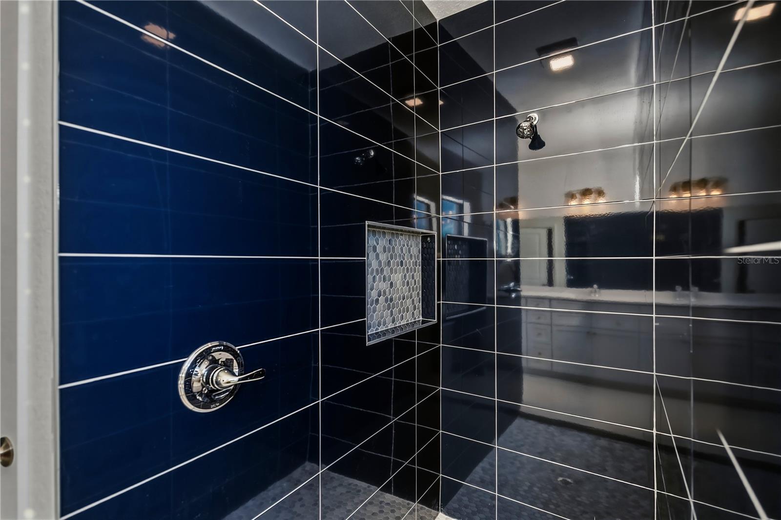 Spa inspired Primary Walk-In Shower.