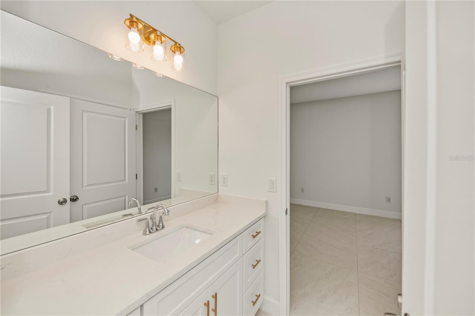 Guest Bath with Quartz Vanity.