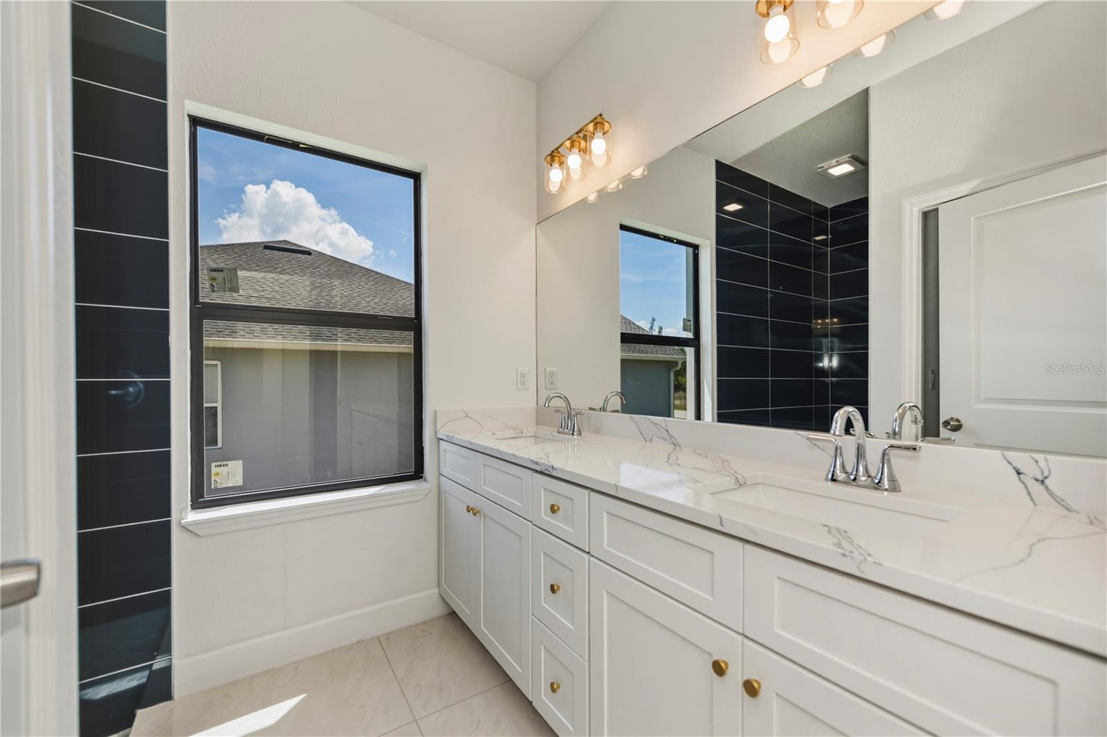 Primary Bath with Dual Vanities.