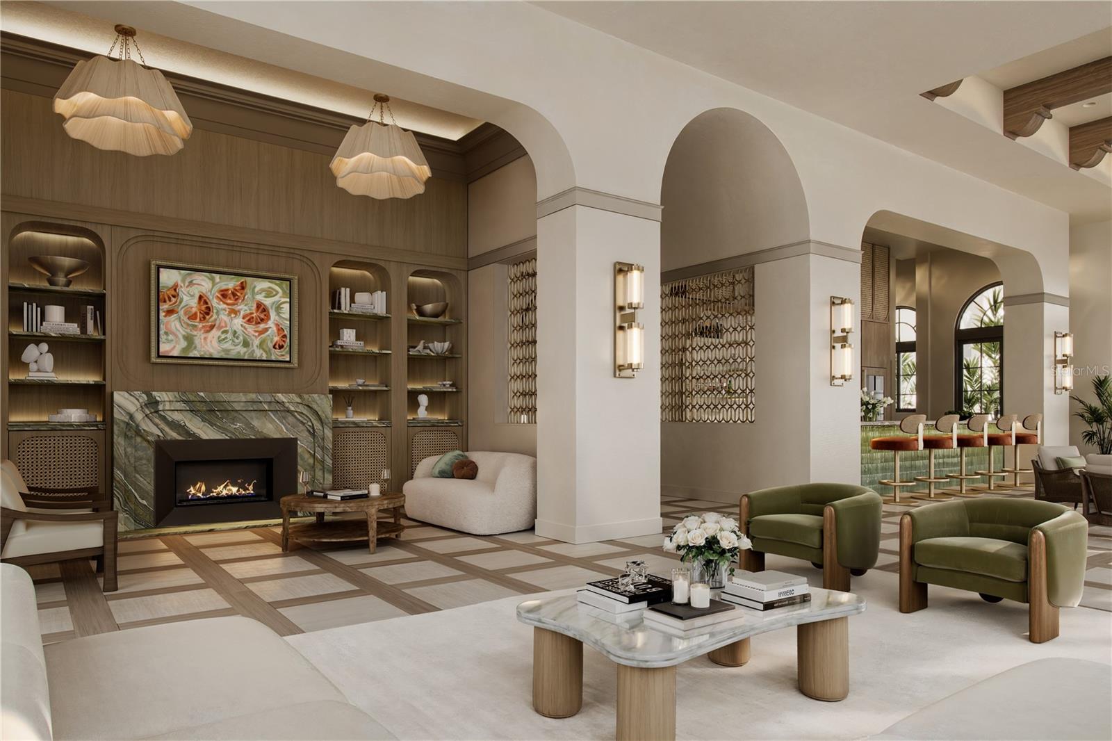 Owner’s Lounge featuring an elegant gathering space centered around a statement fireplace.