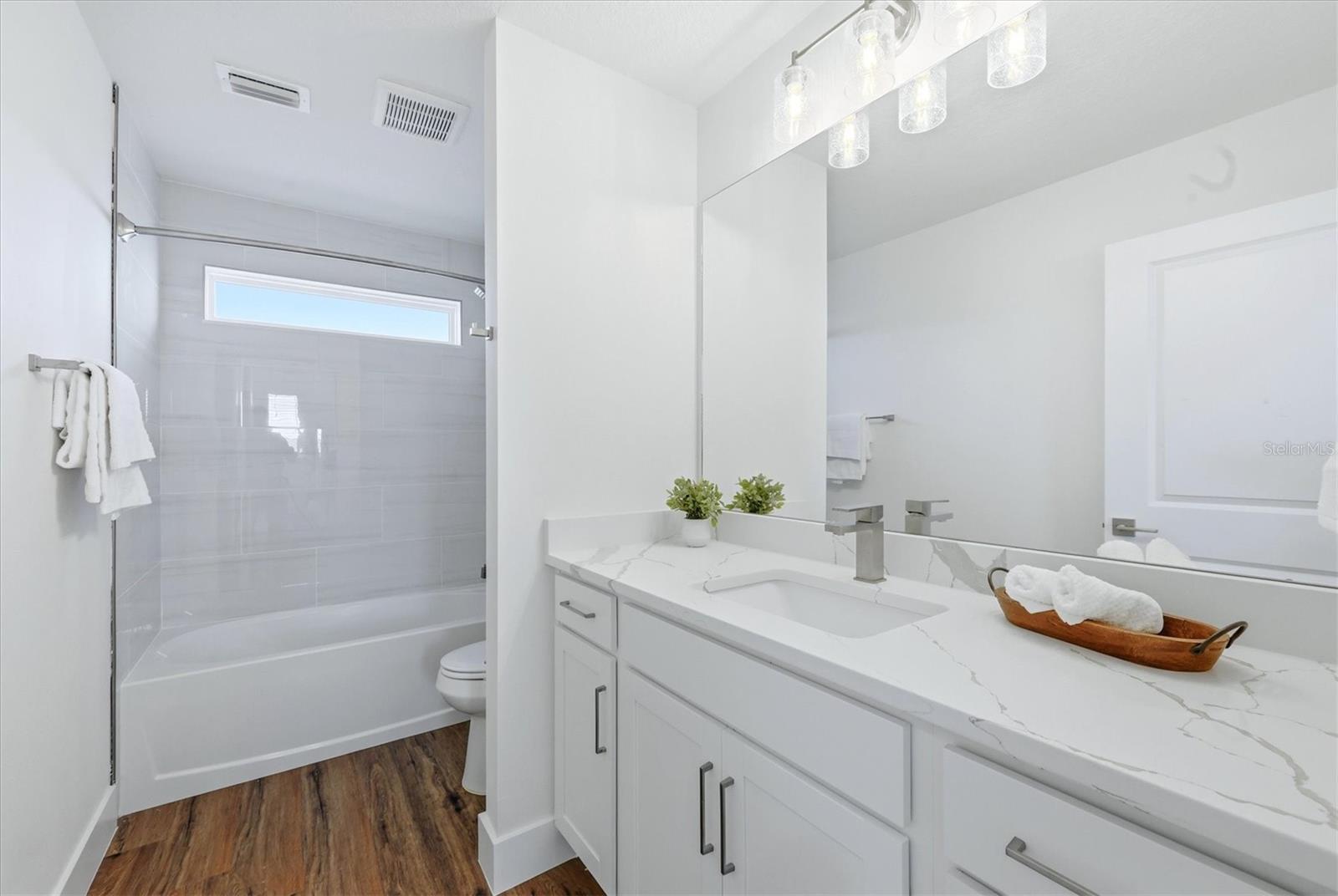 Second floor bathroom with tub/shower combination