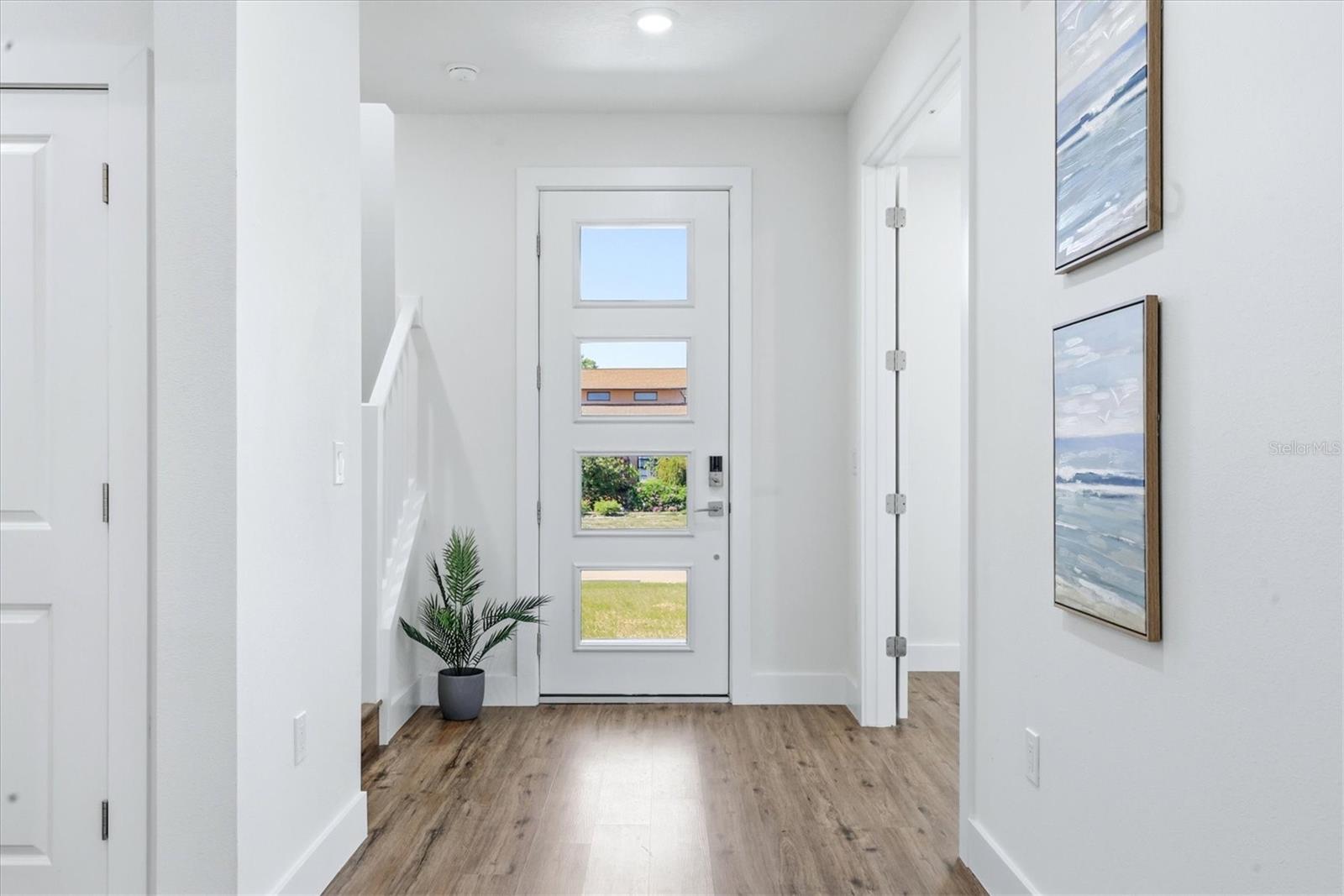 Foyer - den or extra bedroom with French doors to the right