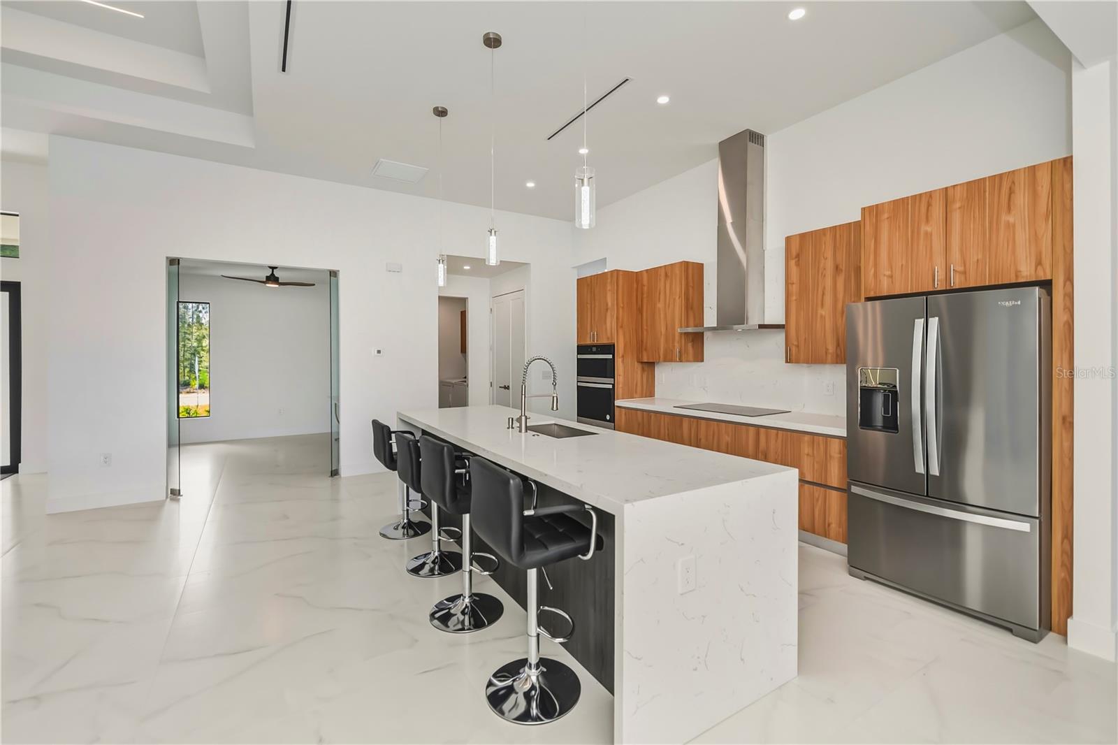 Waterfall Island and Quartz Countertops.