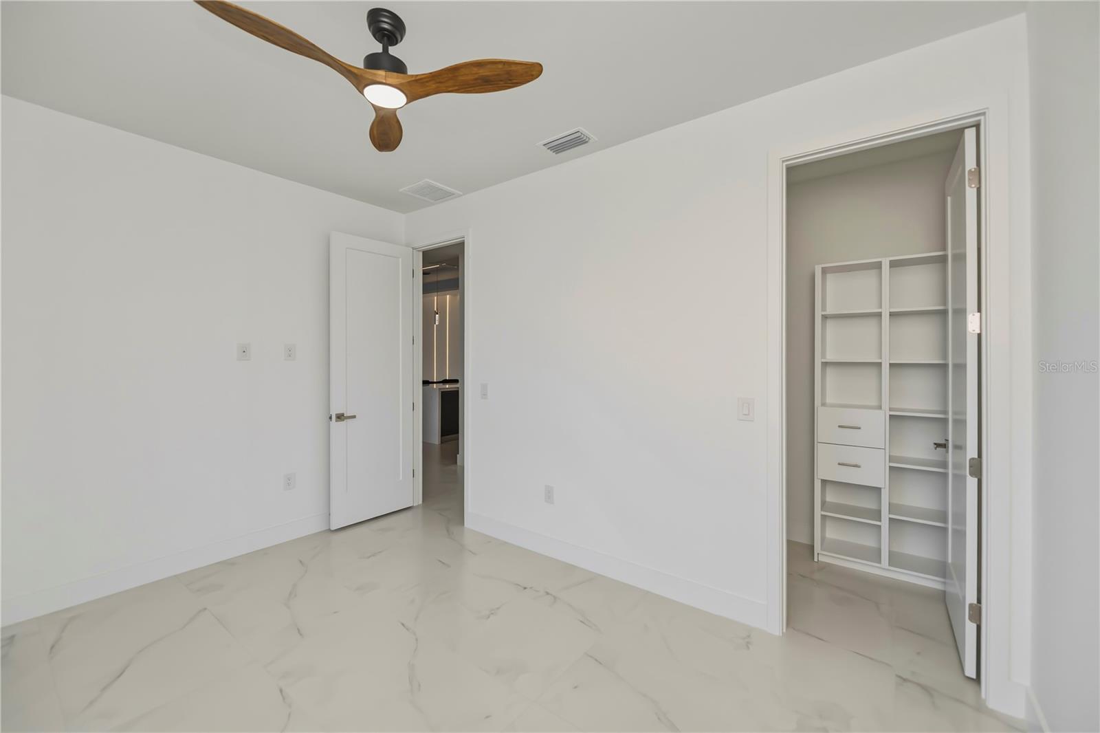 Bedroom 4 with Walk In Closet & Organizers