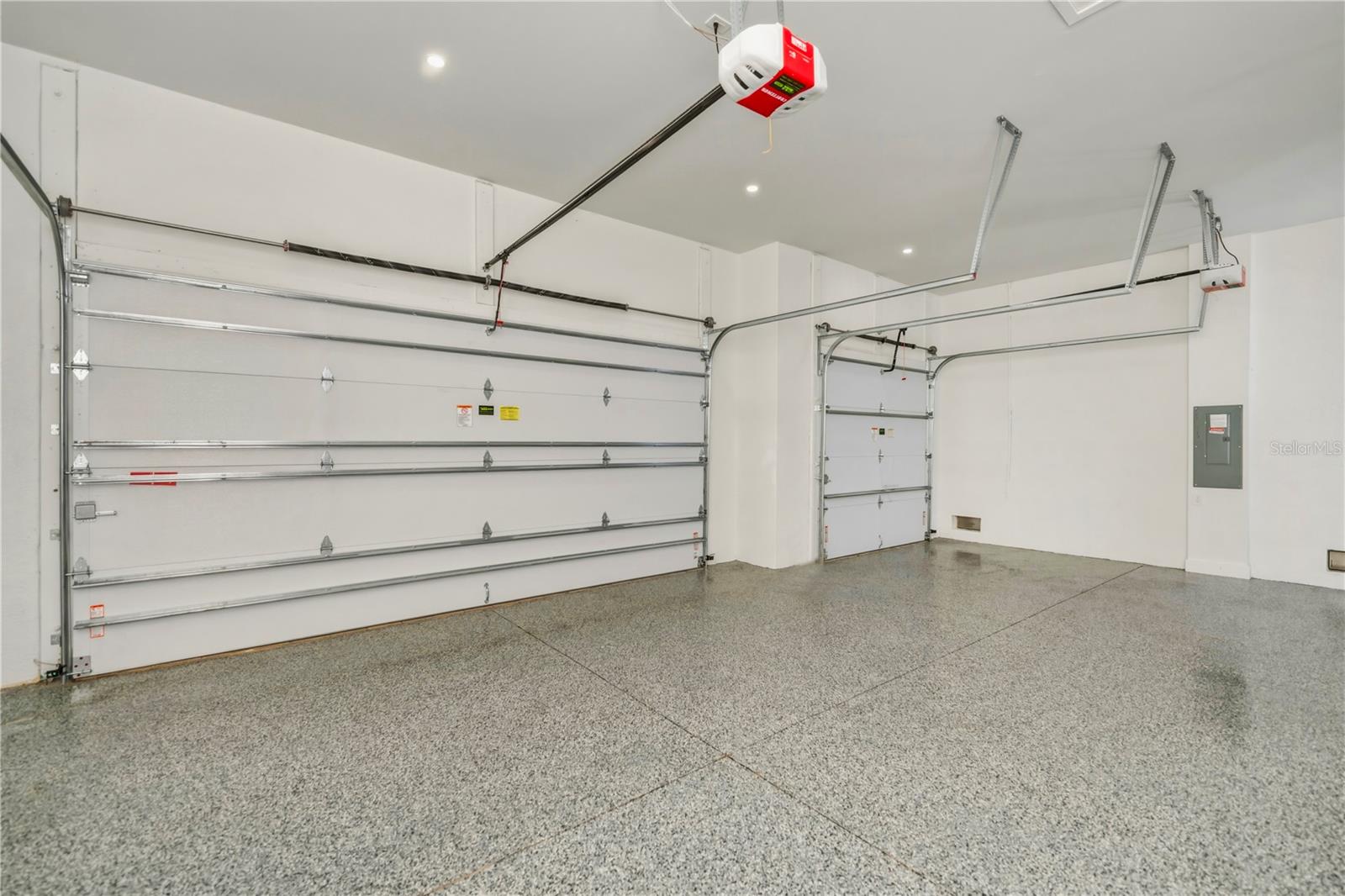 Oversized 3-Car Garage with Epoxy Flooring.