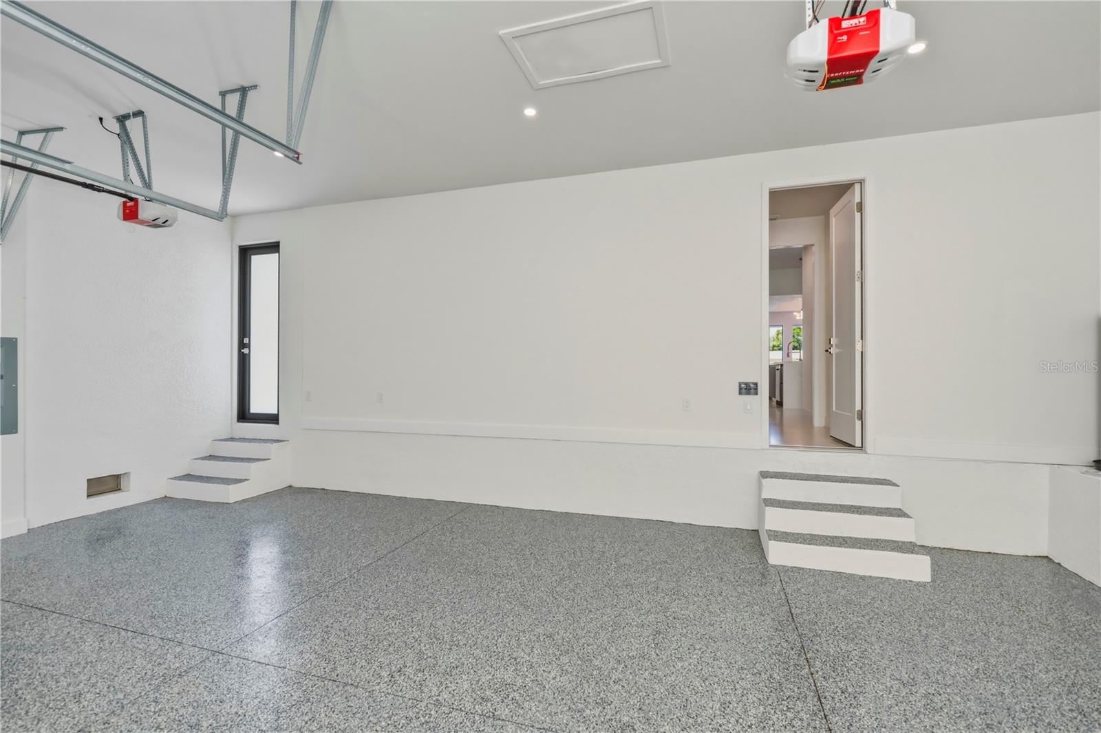 Oversized 3-Car Garage with Epoxy Flooring.