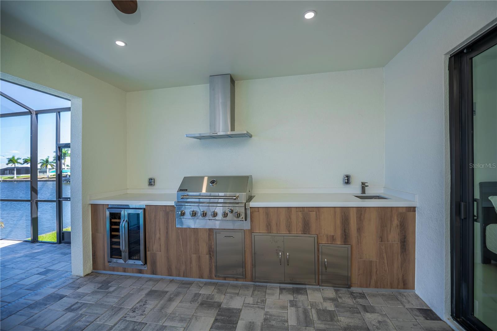 Fully Equipped Outdoor Kitchen with Built-In Grill.