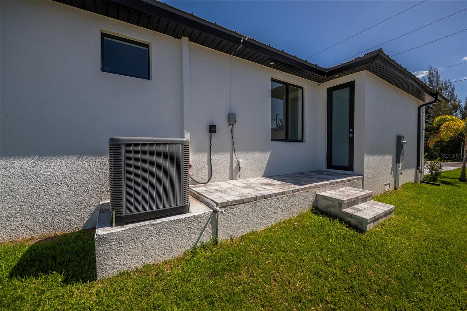 Exterior Service Entrance and Utility Access.
