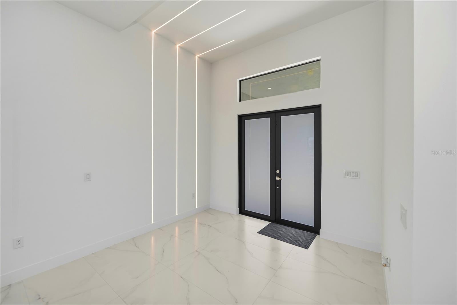 Soaring Ceilings and Linear LED Accent Lighting.