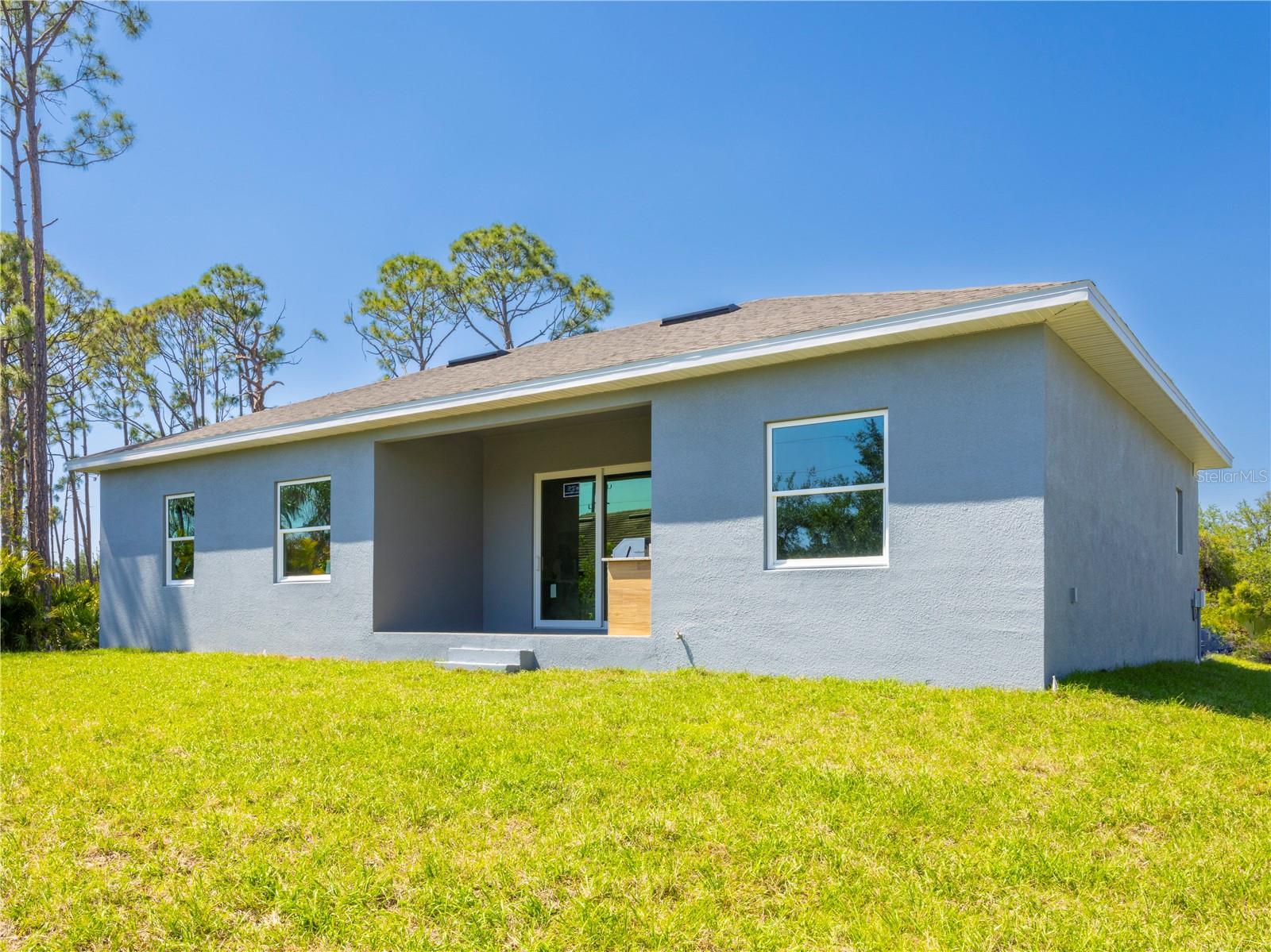 9443 Hallendale Dr, Port Charlotte, FL 33981 — photo 4 of 13