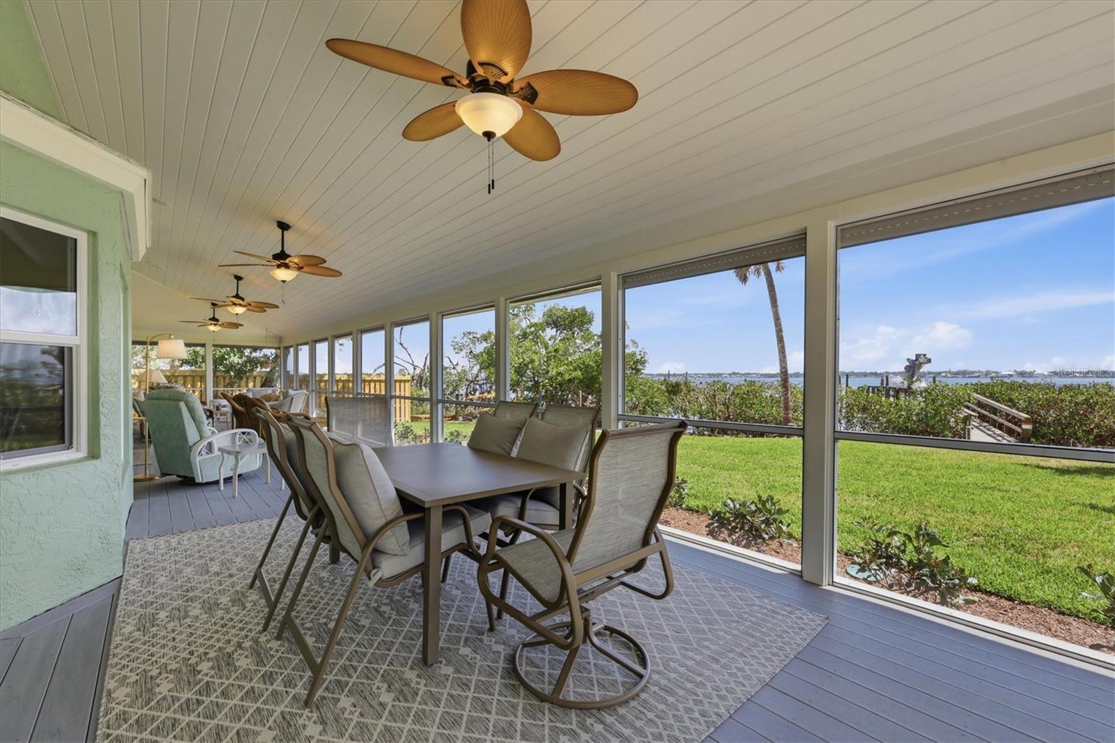 Dining Area in Screened Lanai with View of Lemon Bay