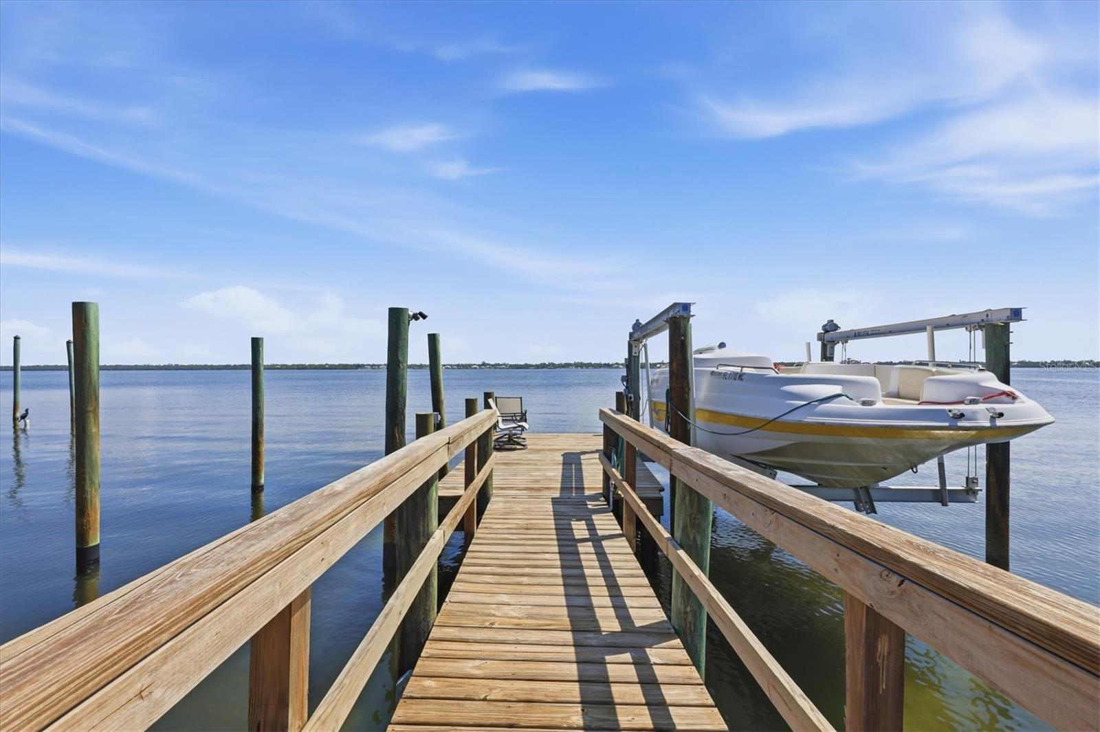 Shared Dock With Pilings for a Lift (current lift belongs to neighbor that shares dock)