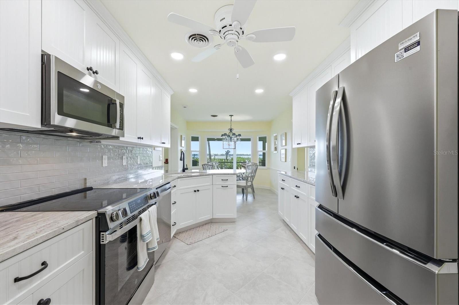 Updated Kitchen Open to Breakfast Nook With Bay Views