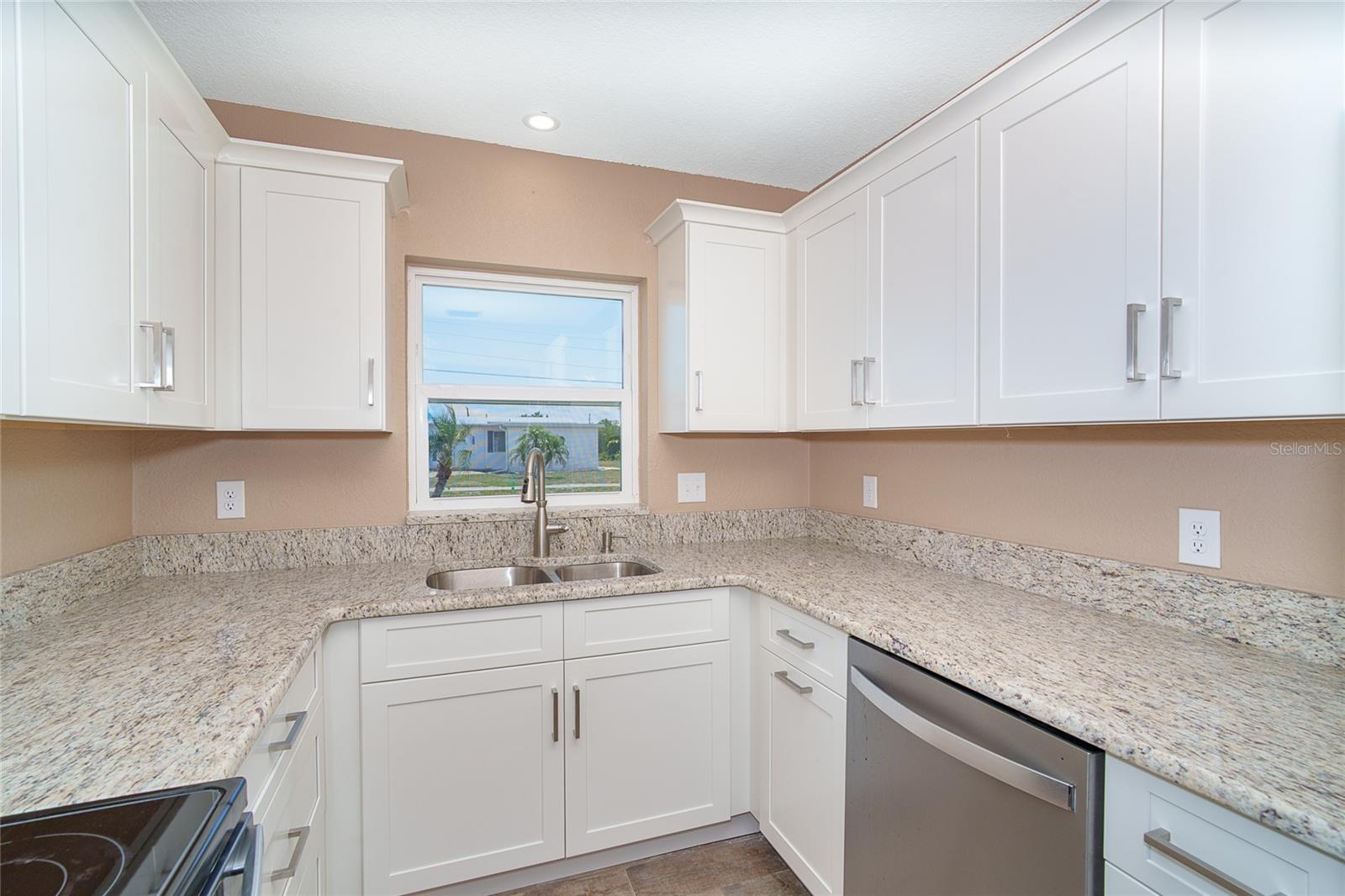Kitchen with plenty of counter space and cabinets