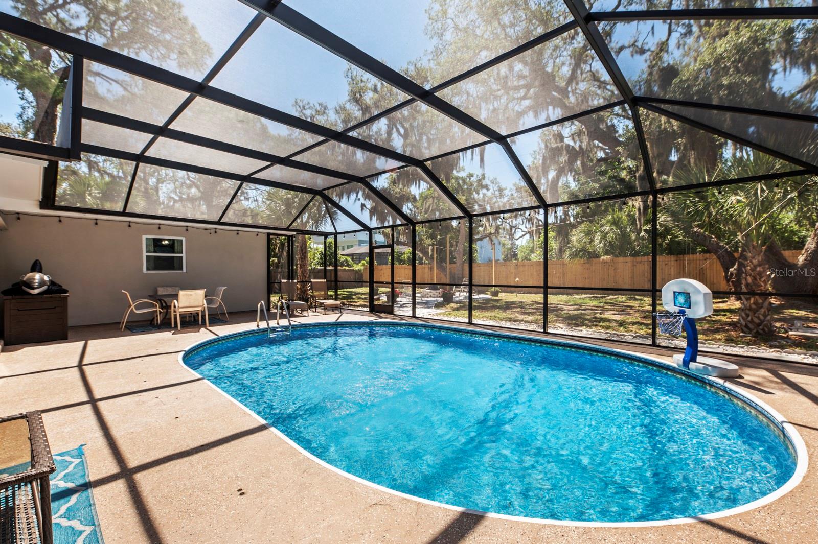 View of pool deck. Pool cage is now taken down.