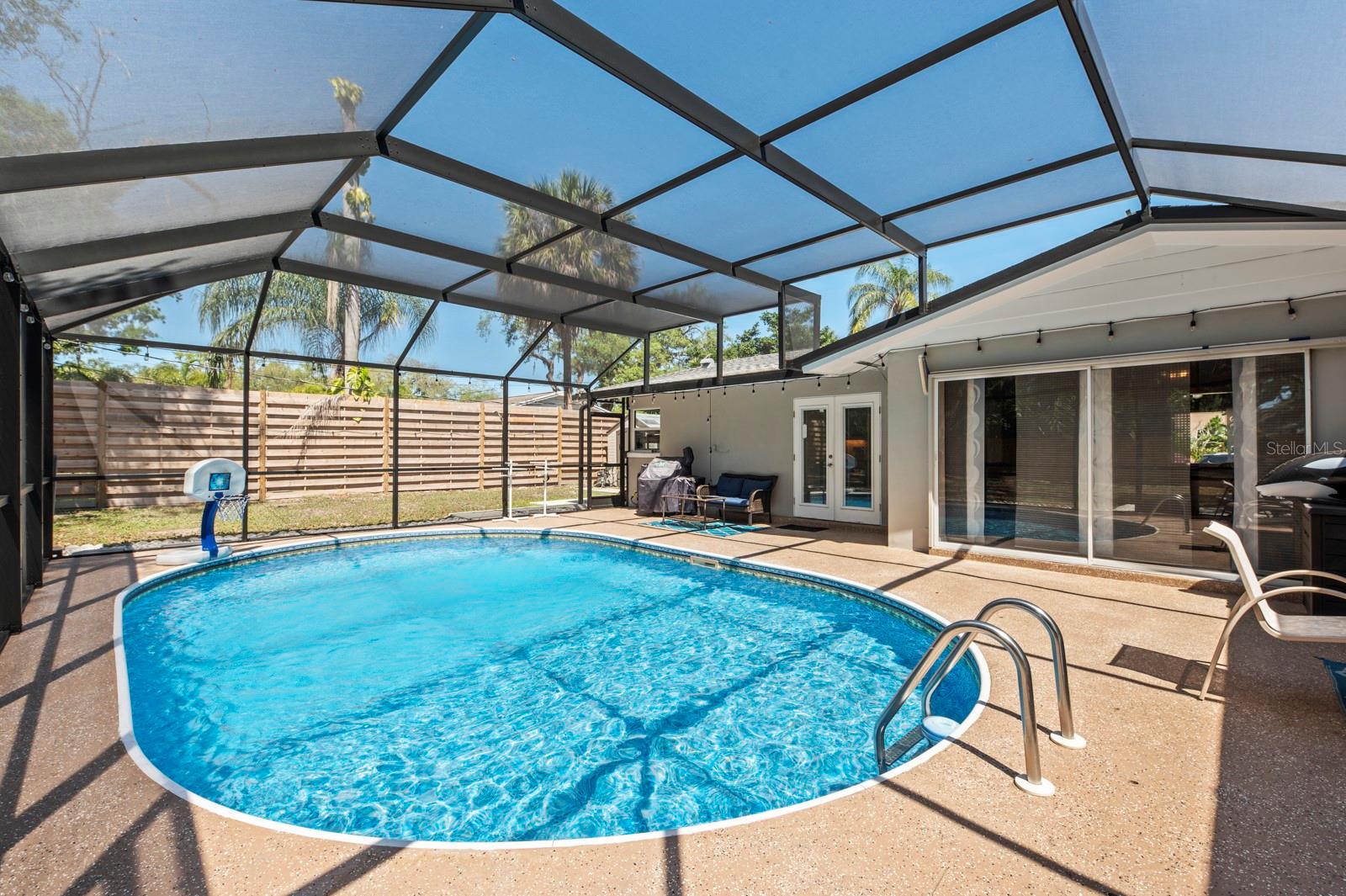 Another view of pool deck. Pool cage is now taken down.