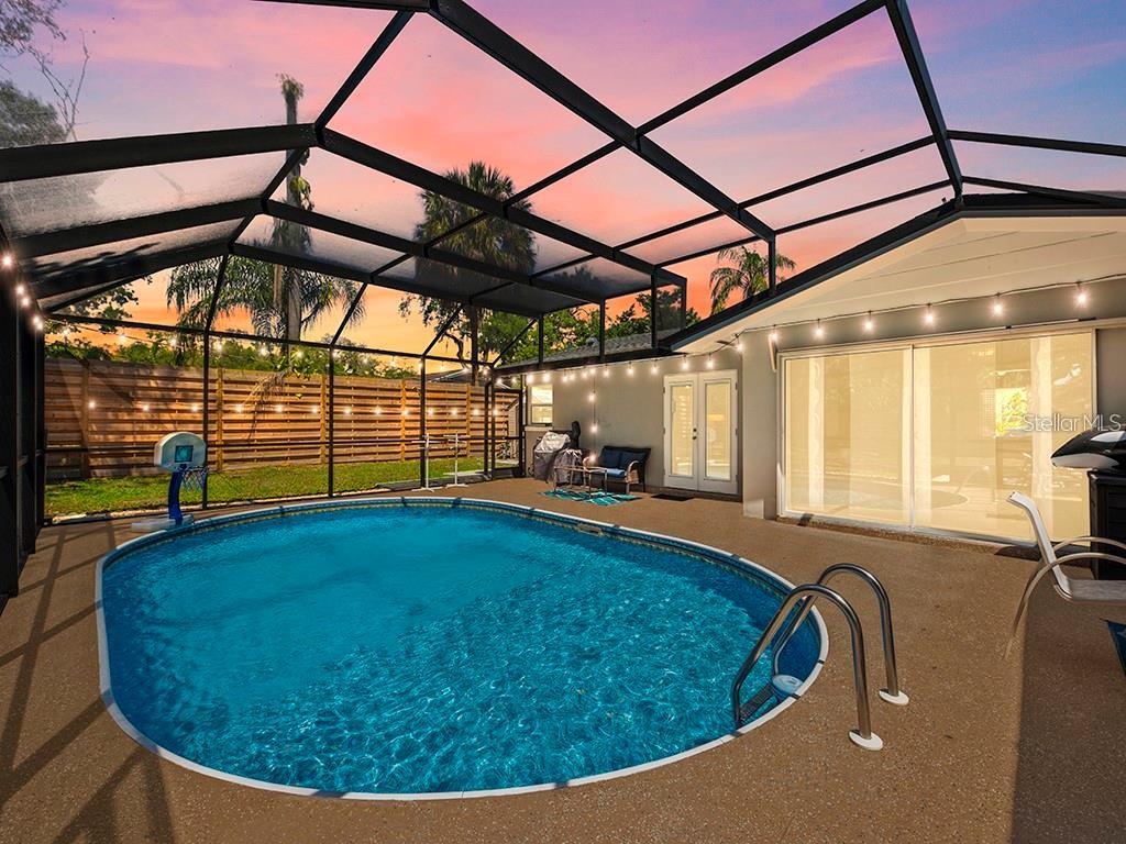 Lighting at night. Pool cage is now taken down.