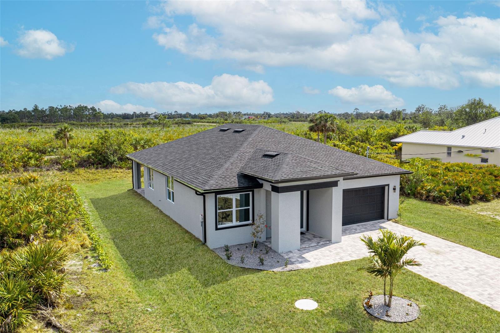 384 Baytree Dr, Rotonda West, FL 33947 — photo 2 of 62