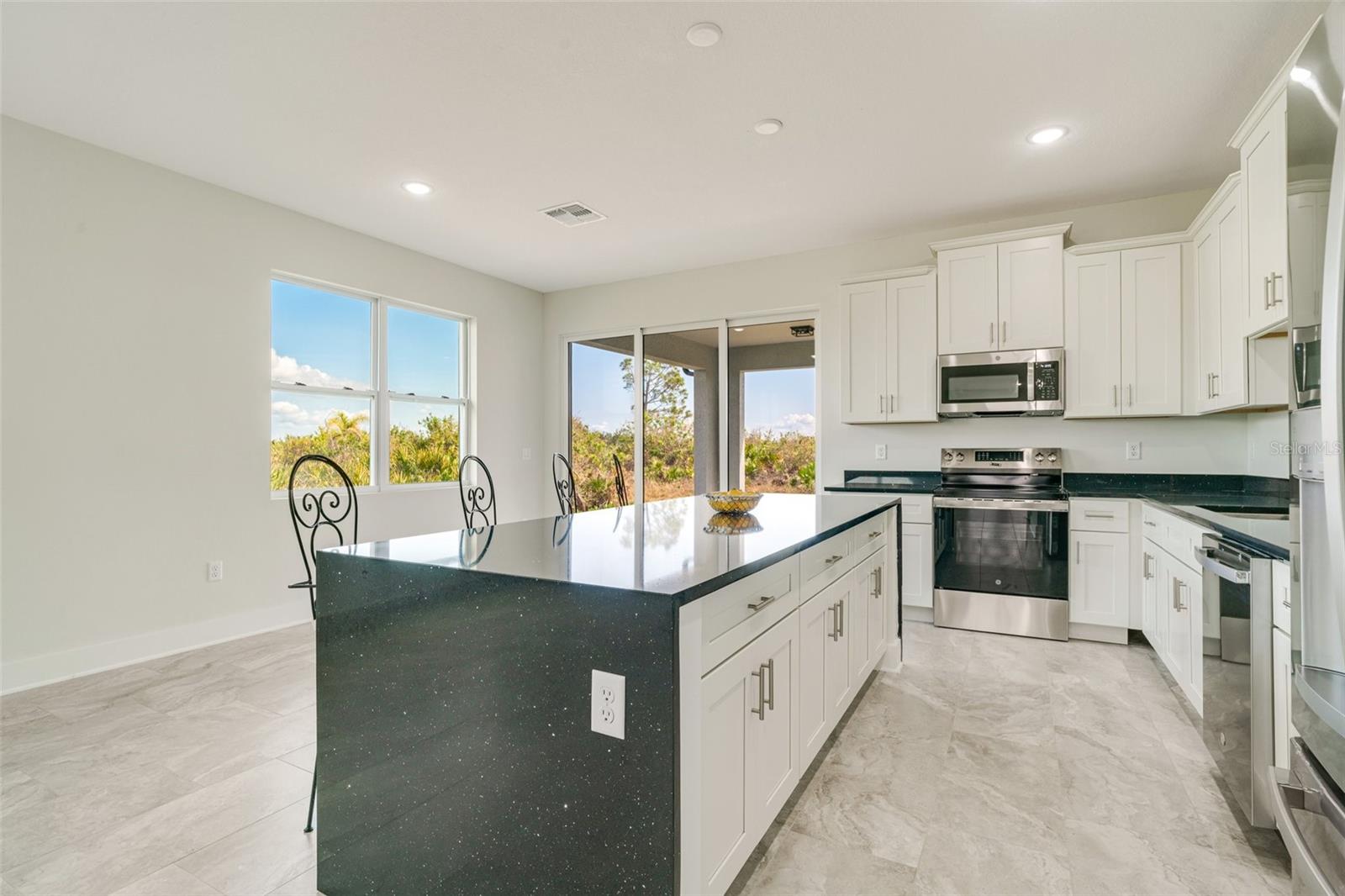 384 Baytree Dr, Rotonda West, FL 33947 — photo 13 of 62
