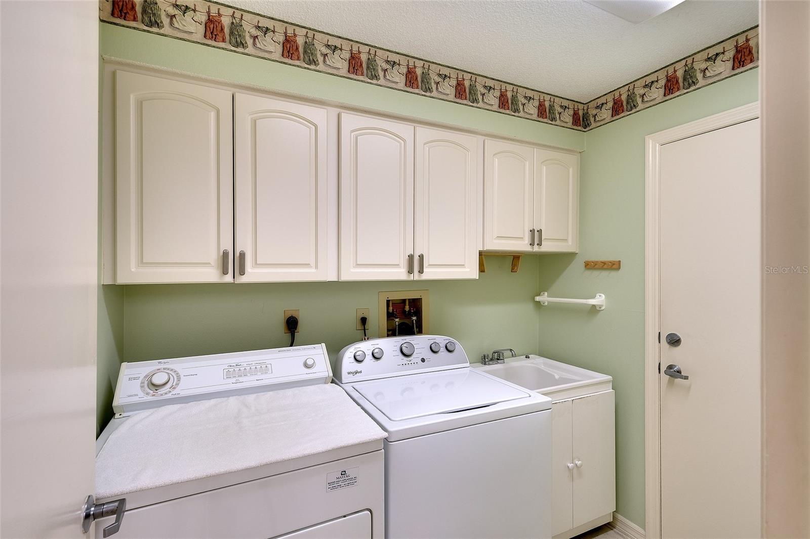 Laundry room with great additional storage