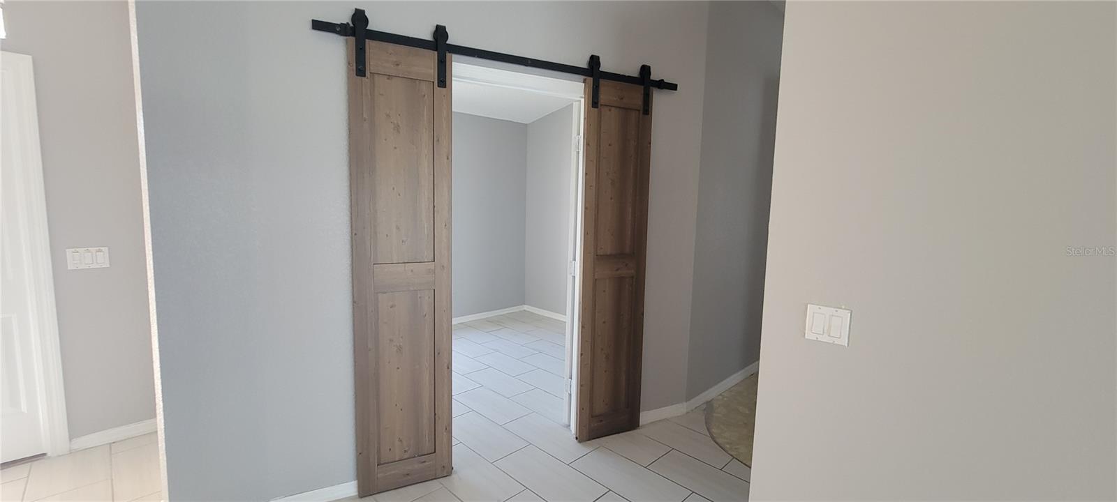 den with barn doors