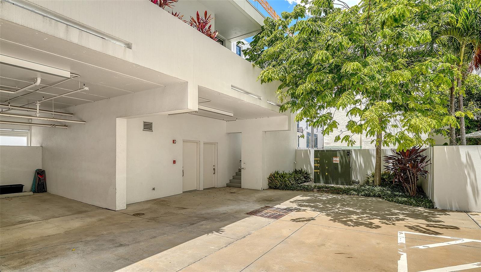 Spacious gated courtyard with secure entry off 4th Way