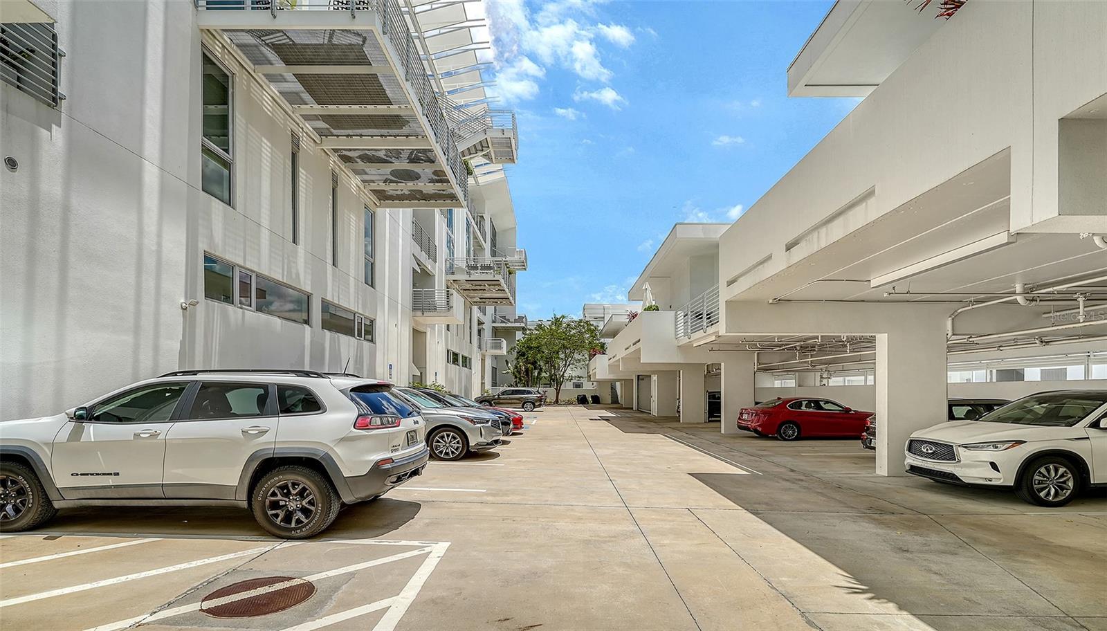 Spacious gated courtyard with secure entry off 4th Way
