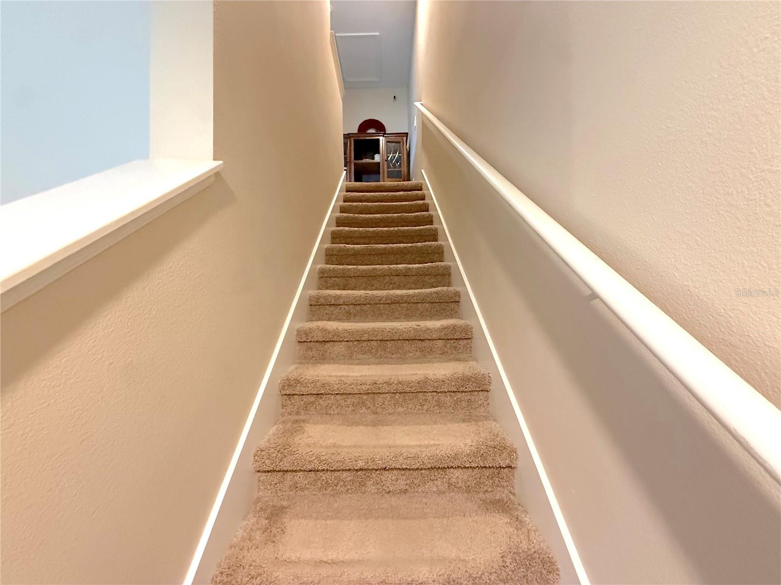 Stairs to Bedrooms (laundry upstairs)