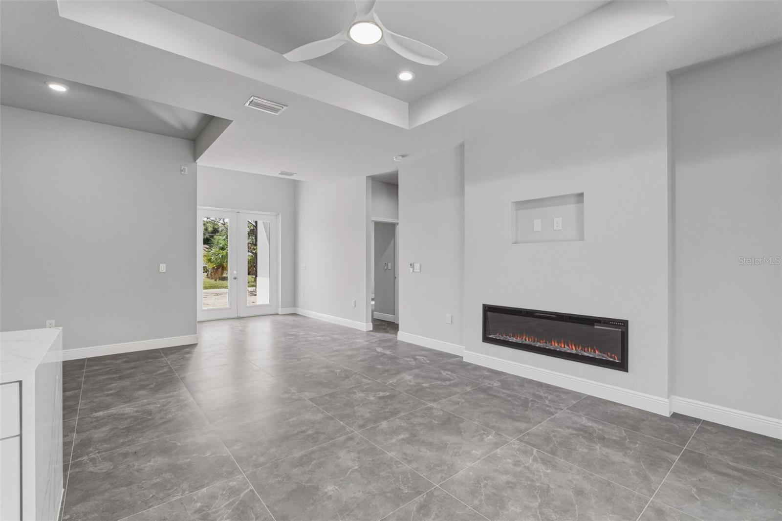 Fireplace and multiple trey ceilings